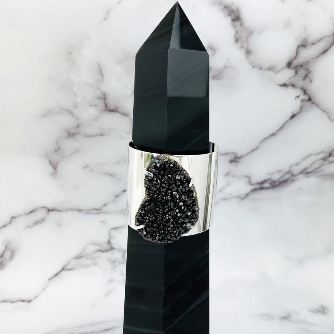 cuff displayed on gemstone tower