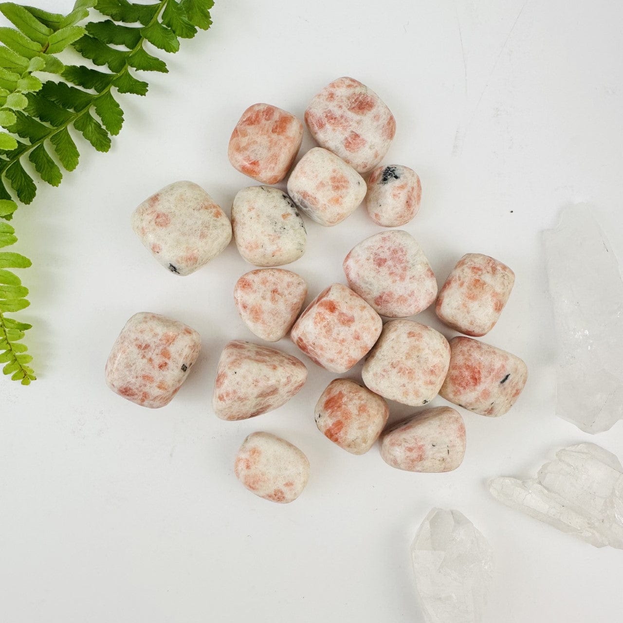 Tumbled Polished Sunstone Stone - 1/2 lb bag showing size and color variations