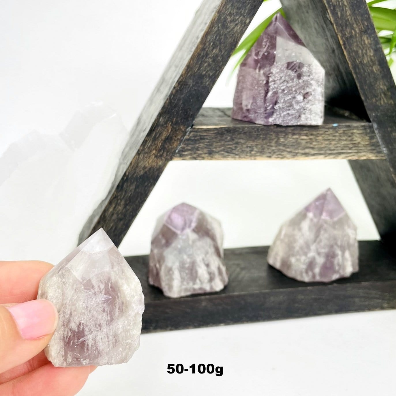 seven minerals in one polished points showing weight in grams
