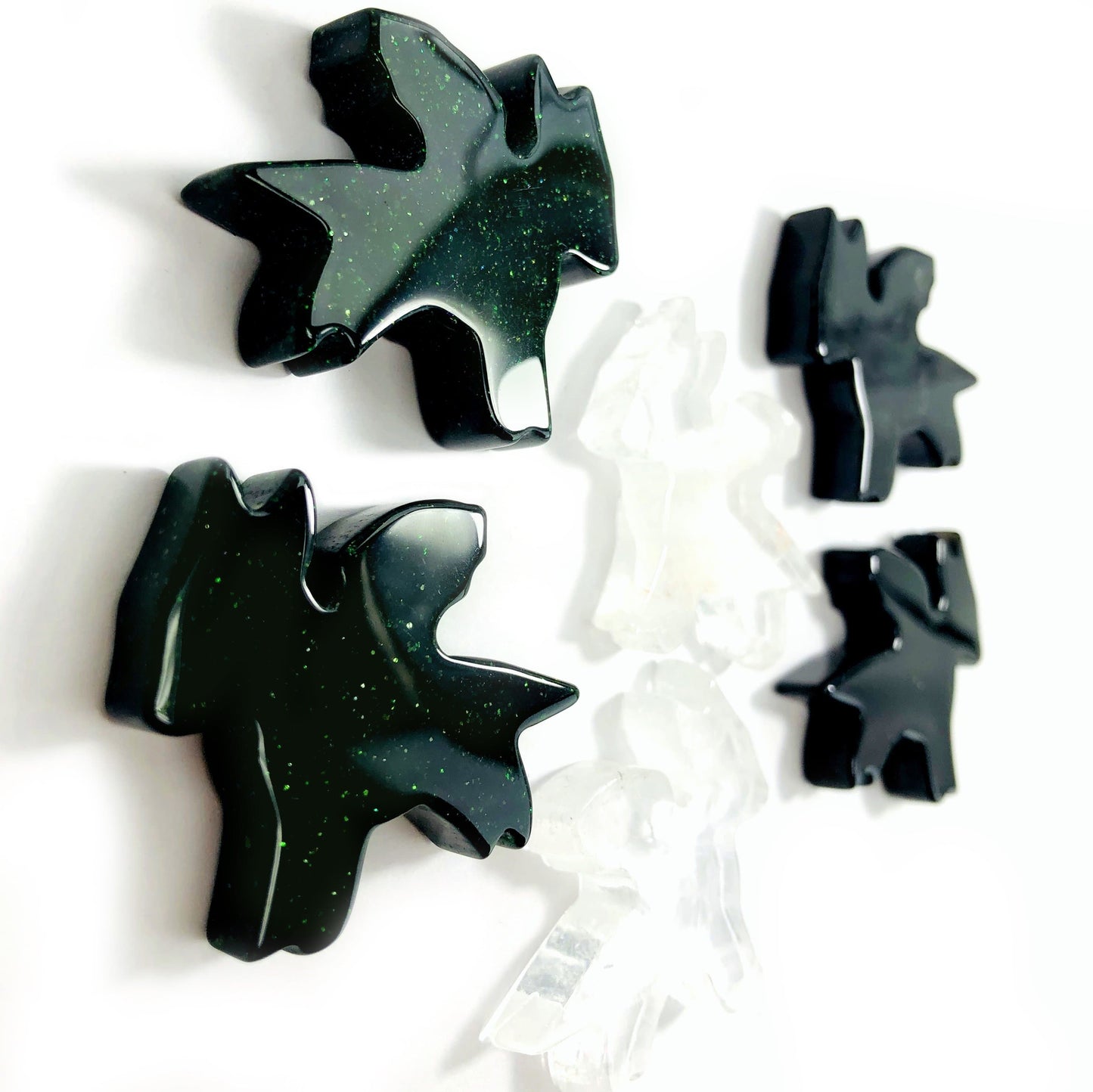 side view of the green goldstone and crystal quartz dragons for the thickness reference