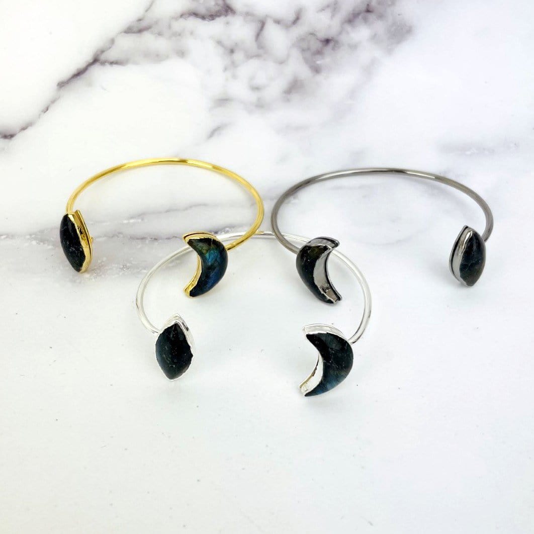 labradorite cuffs displayed to show color variation