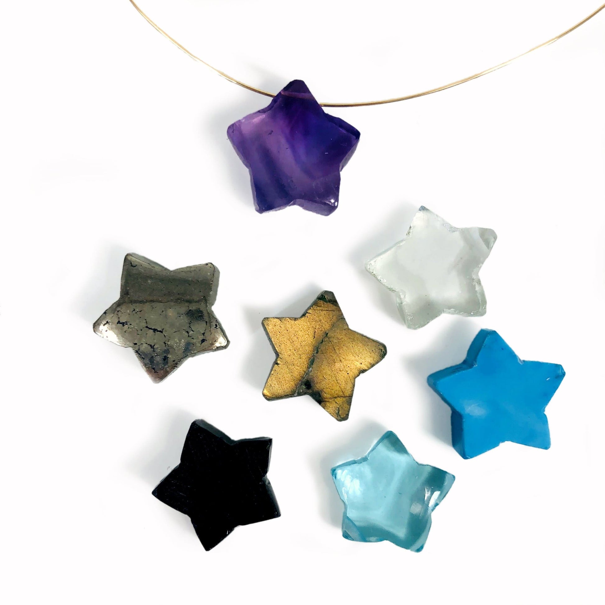 gemstone star beads on a table