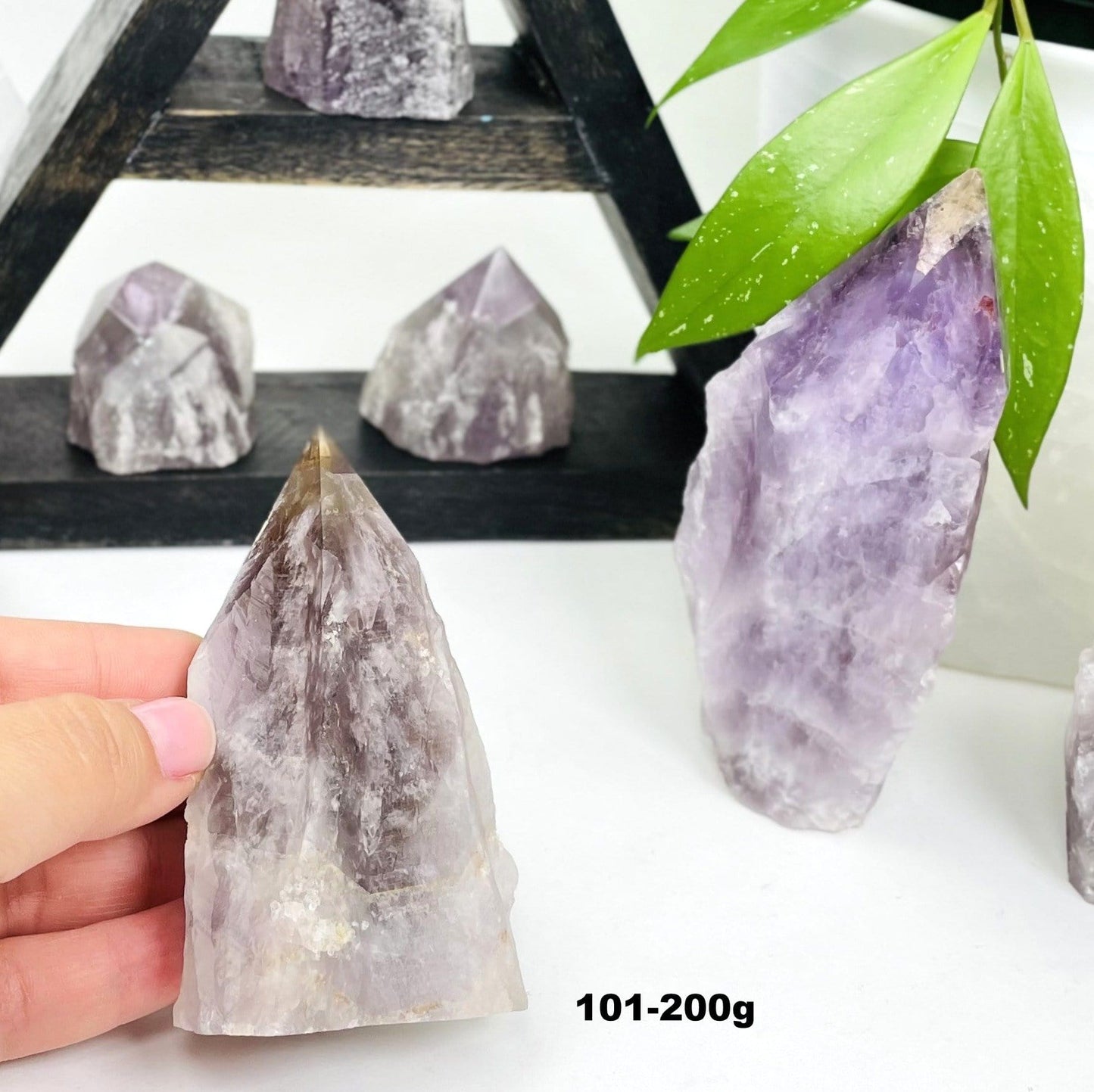 seven minerals in one polished points showing weight in grams