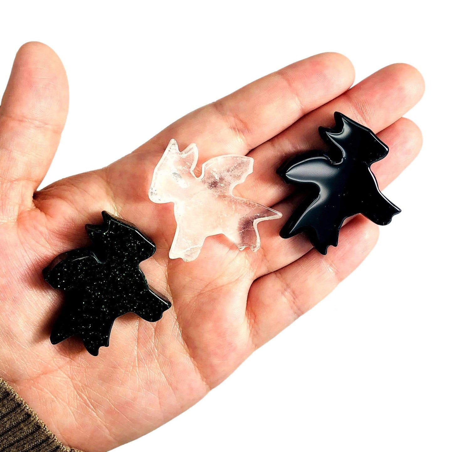 3 dragons on hand for size reference