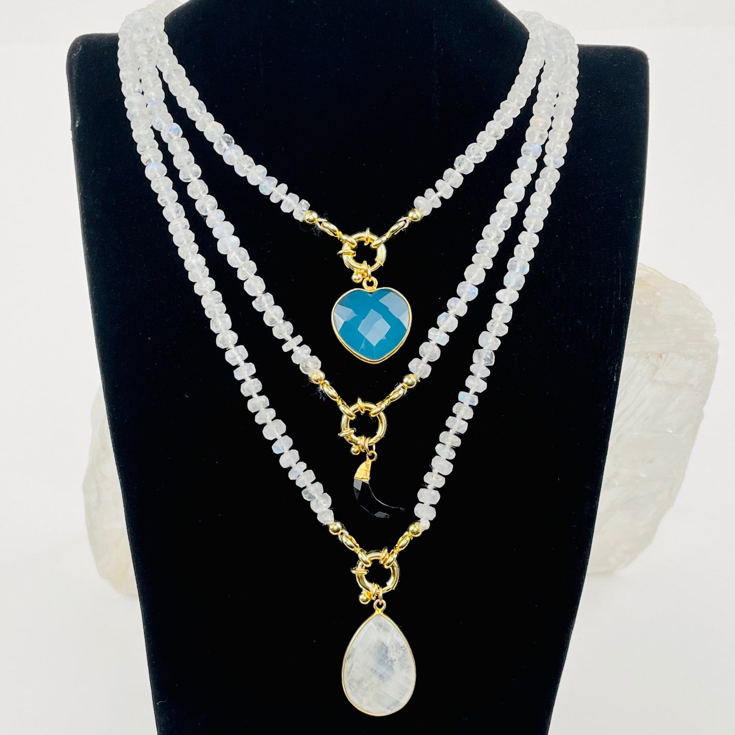 necklaces displayed with some candy charm pendants 