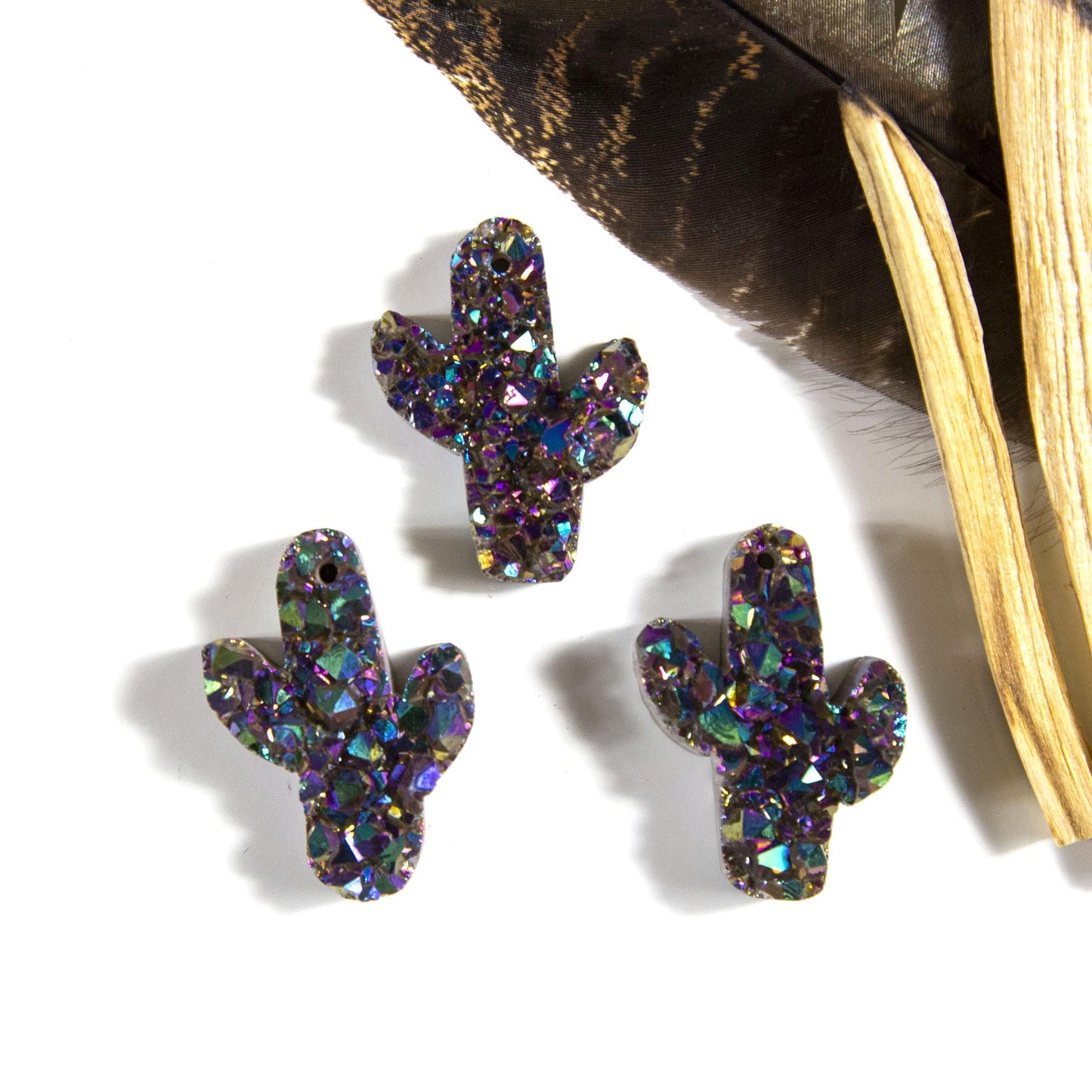titanium druzy cactus with decorations in the background