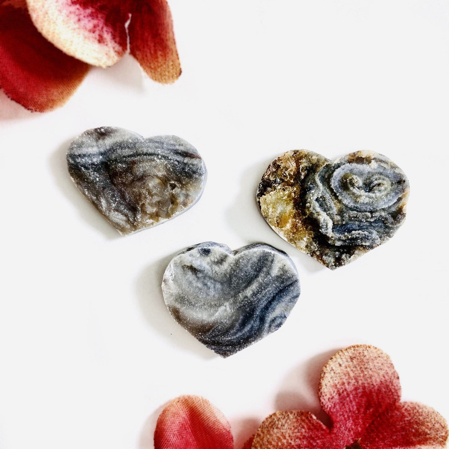chalcedony hearts on a table