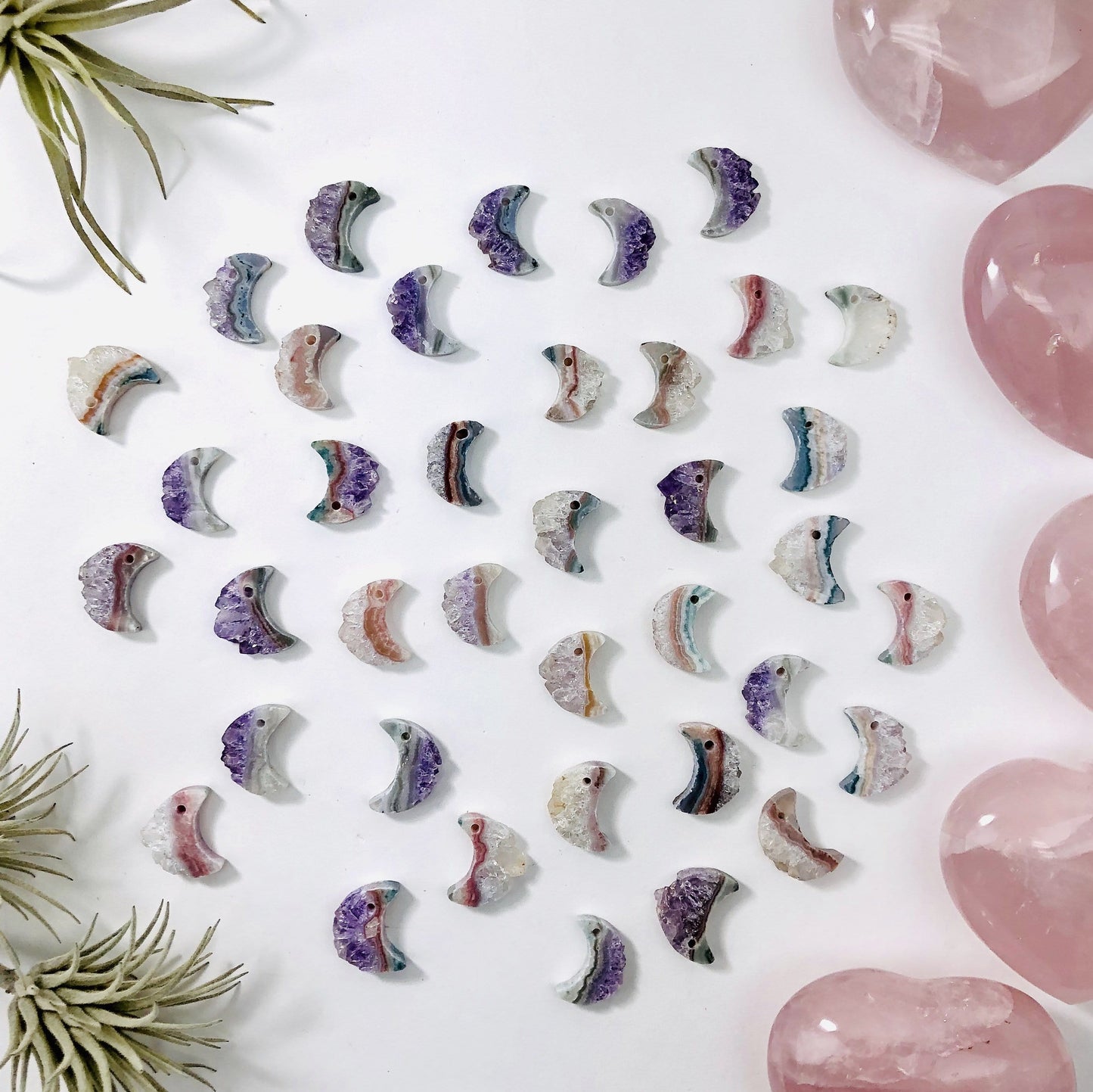 amethyst moon crescents with decorations in the background