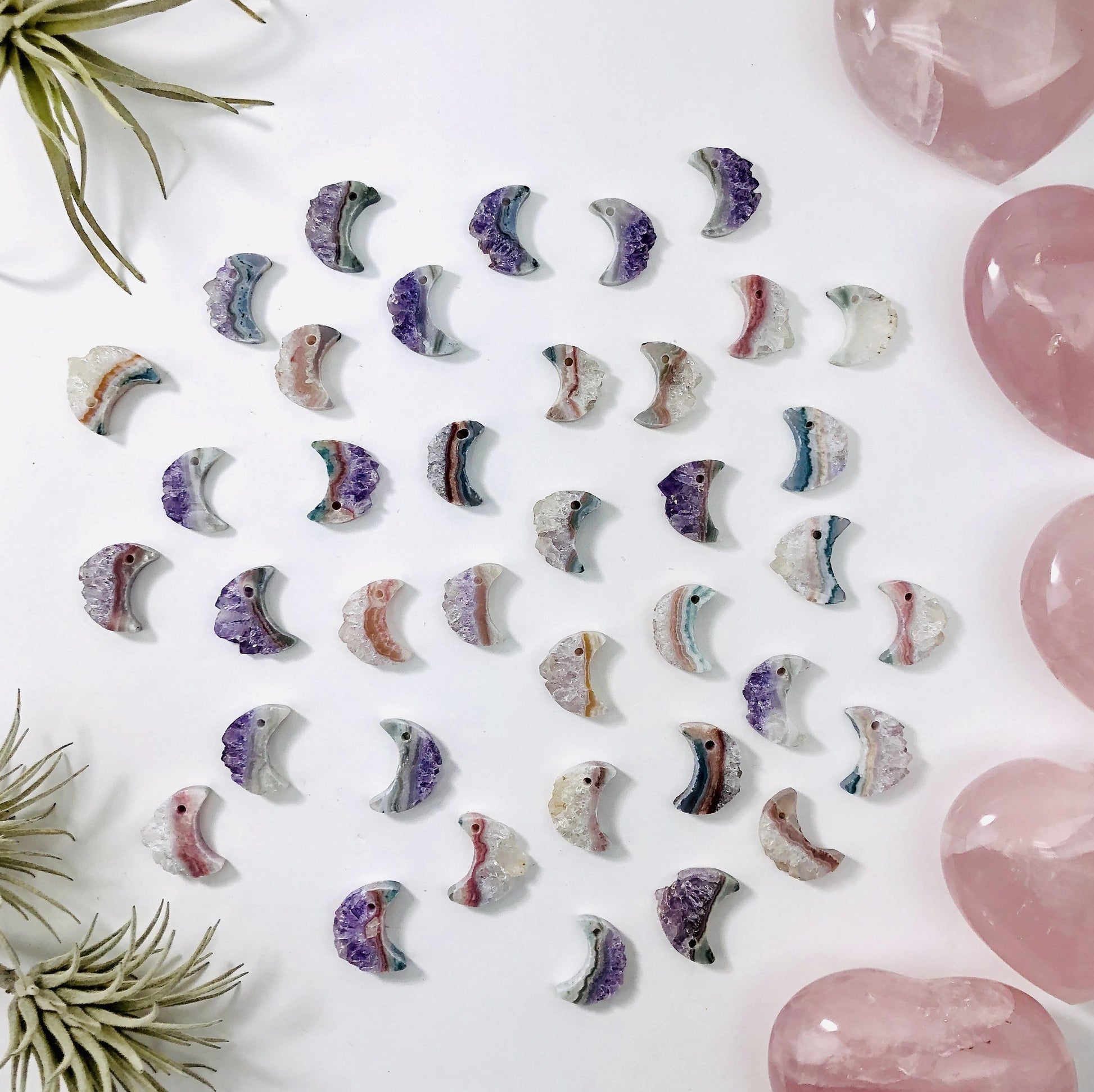amethyst moon crescents with decorations in the background