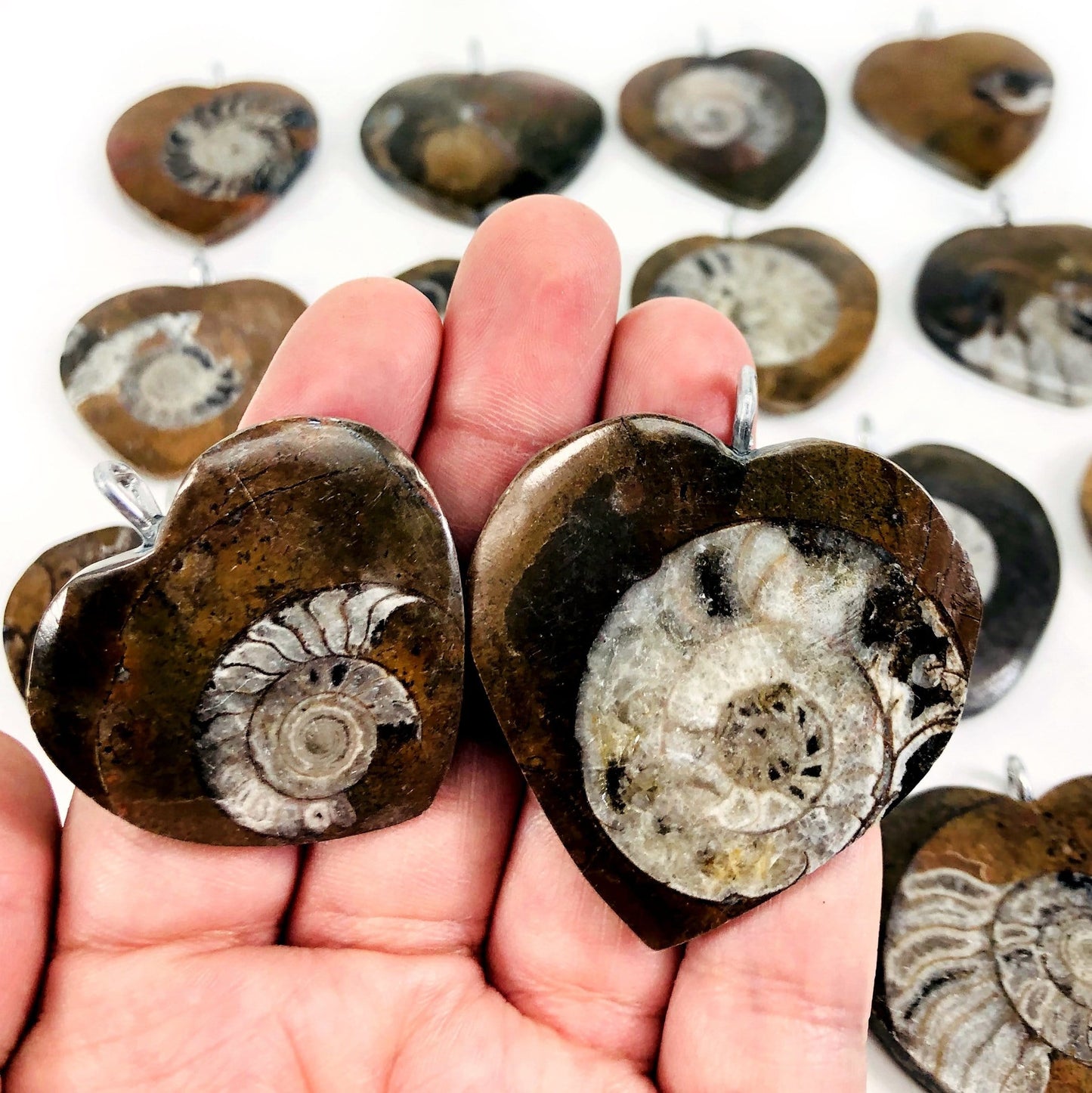 2 pendants in a hand