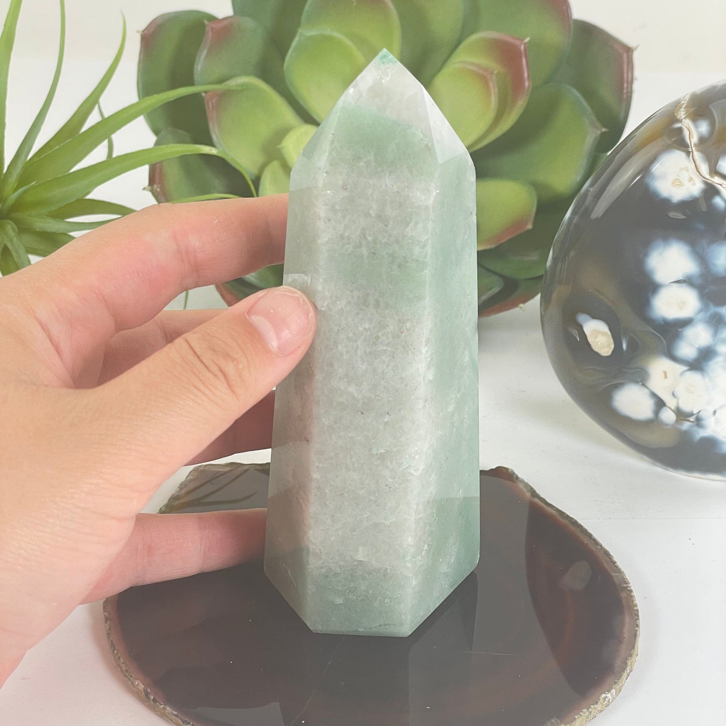 Green and White Quartz Polished Crystal Point - One-of-a-Kind with hand for size reference