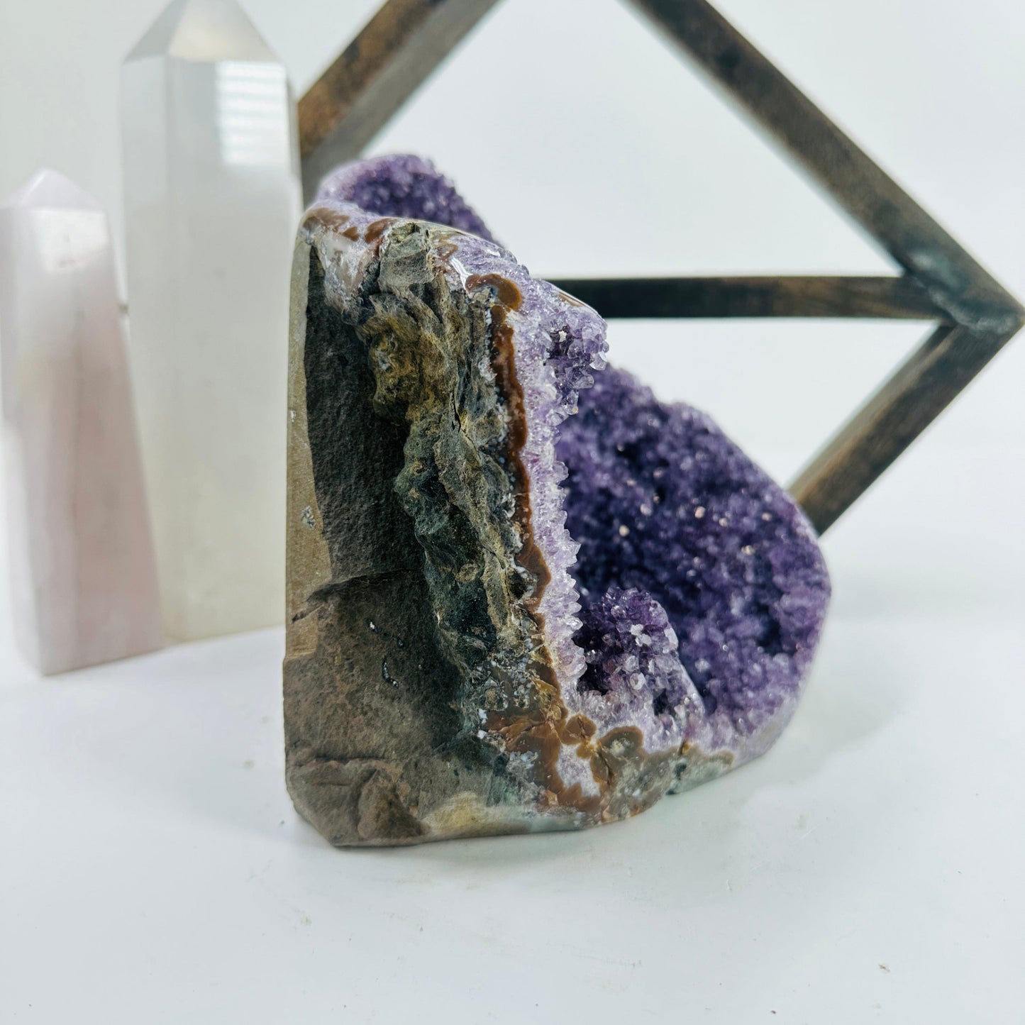 amethyst cut base with decorations in the background