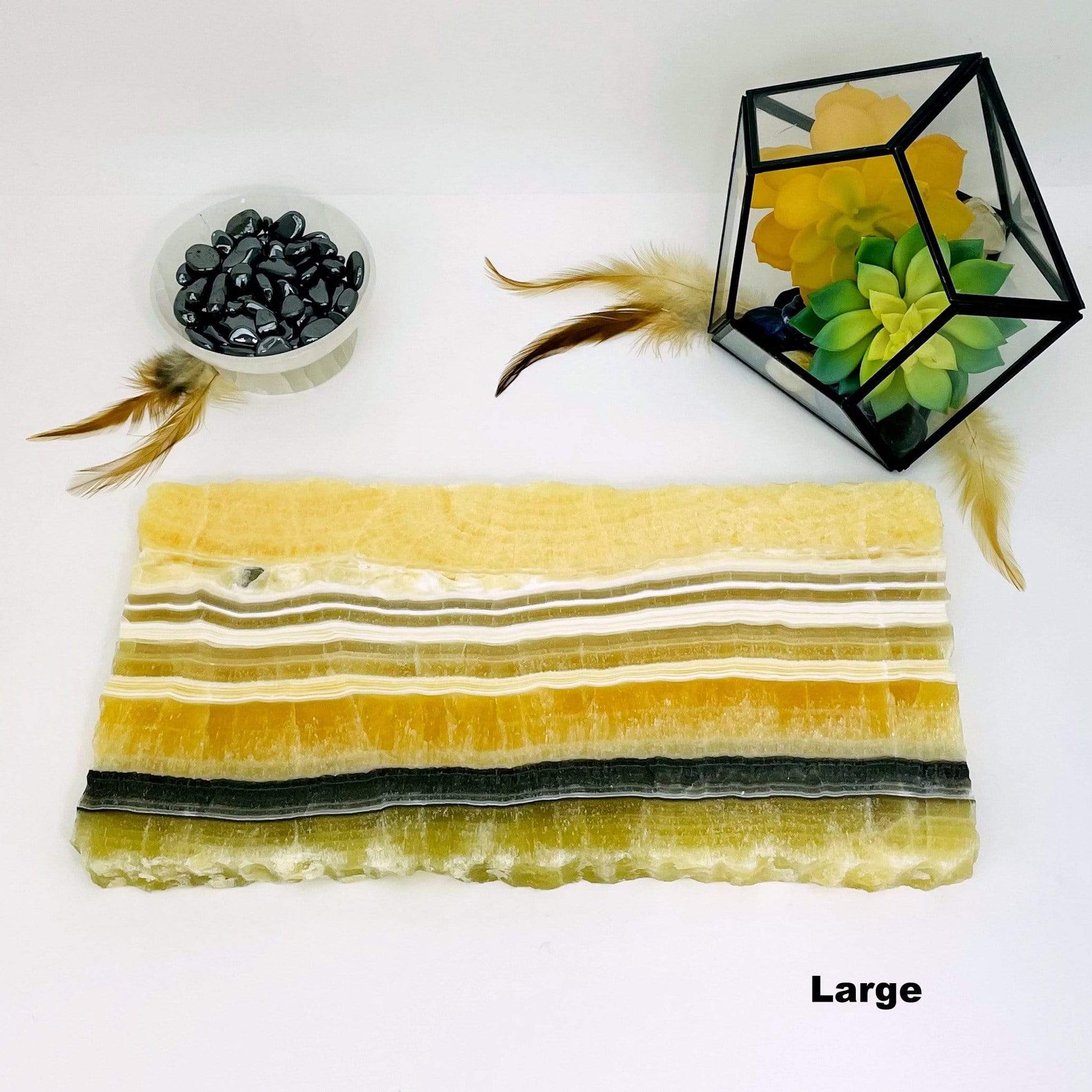 large Mexican onyx platter with decorations in the background