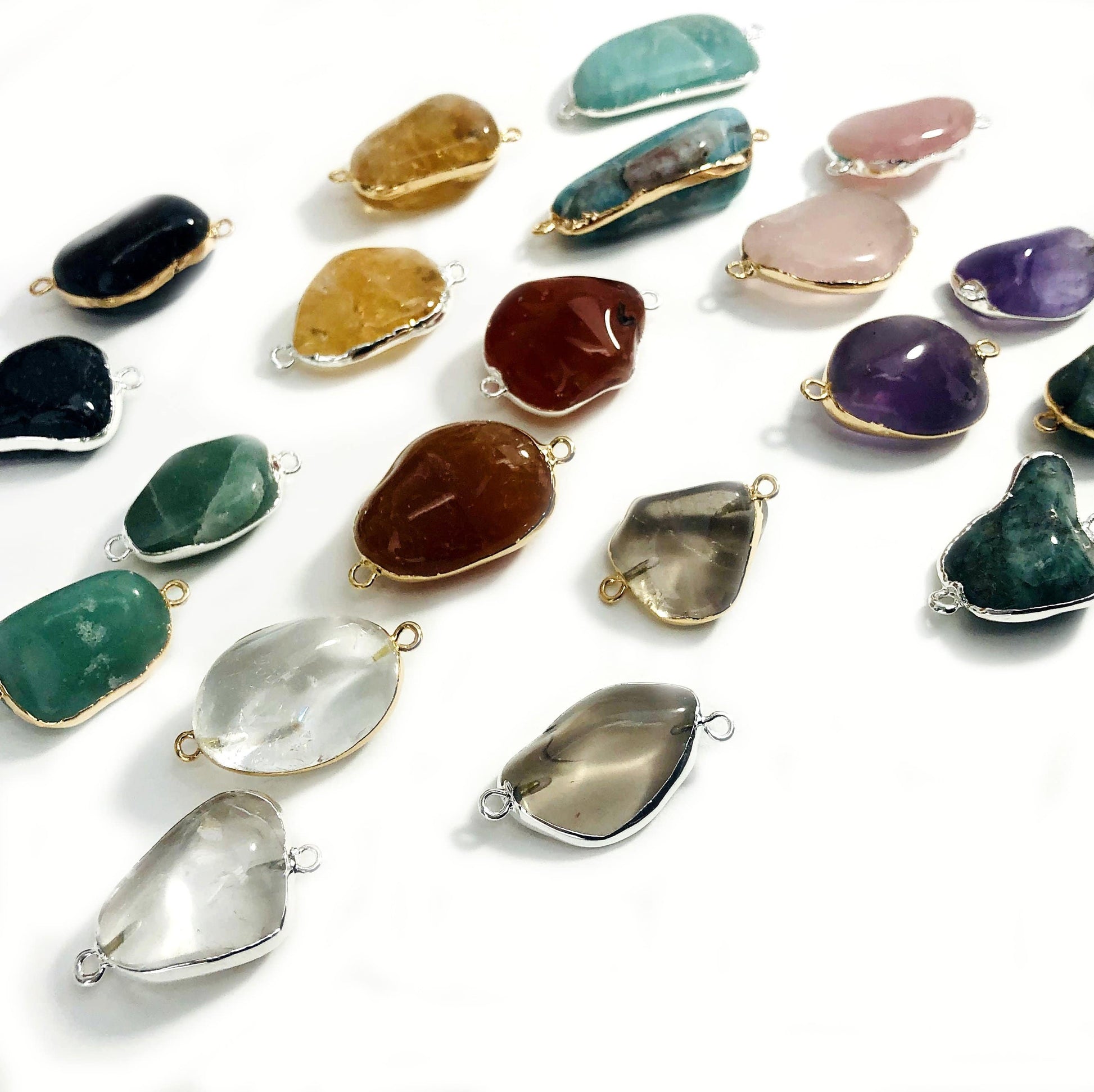 gemstone connector pendants on white background