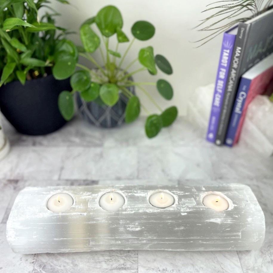 4 votive selenite candle holder on display