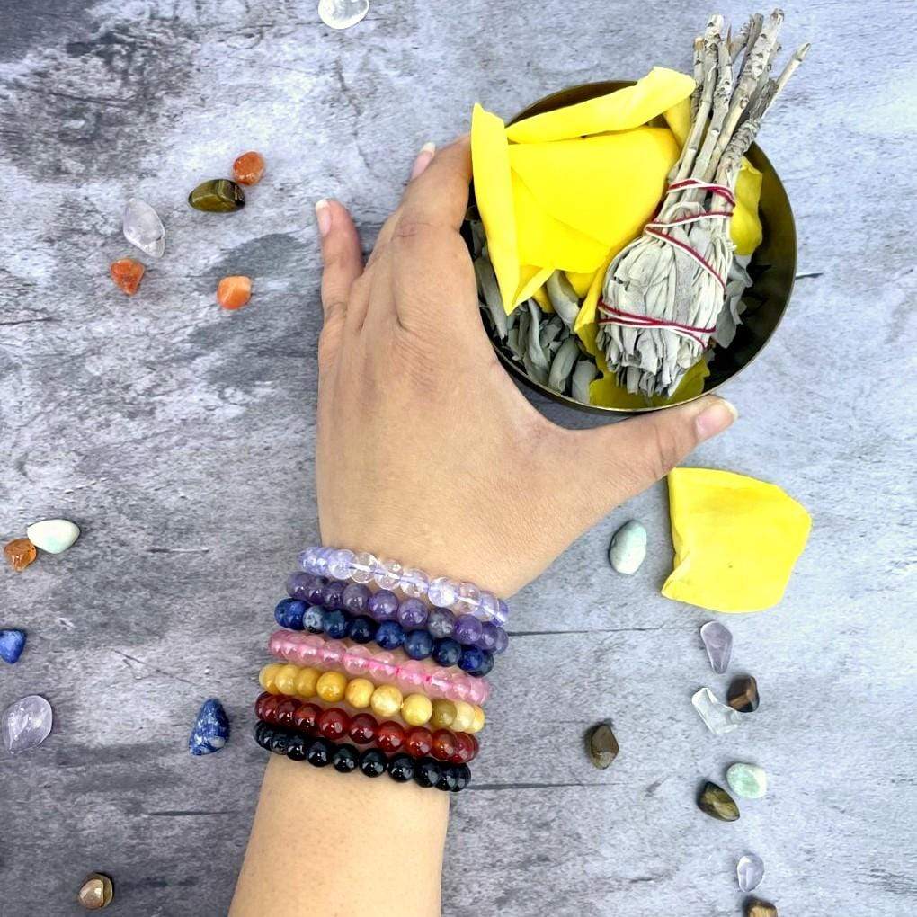 Chakra Bracelet Set - 7 Mala Bead Bracelets on a wrist