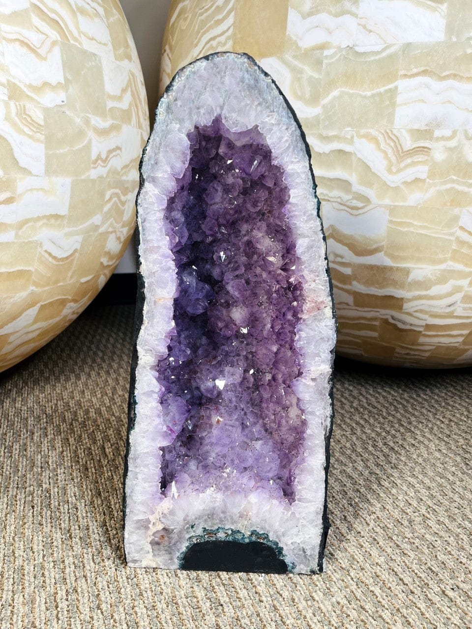 Amethyst Crystal Cathedral Geode on display