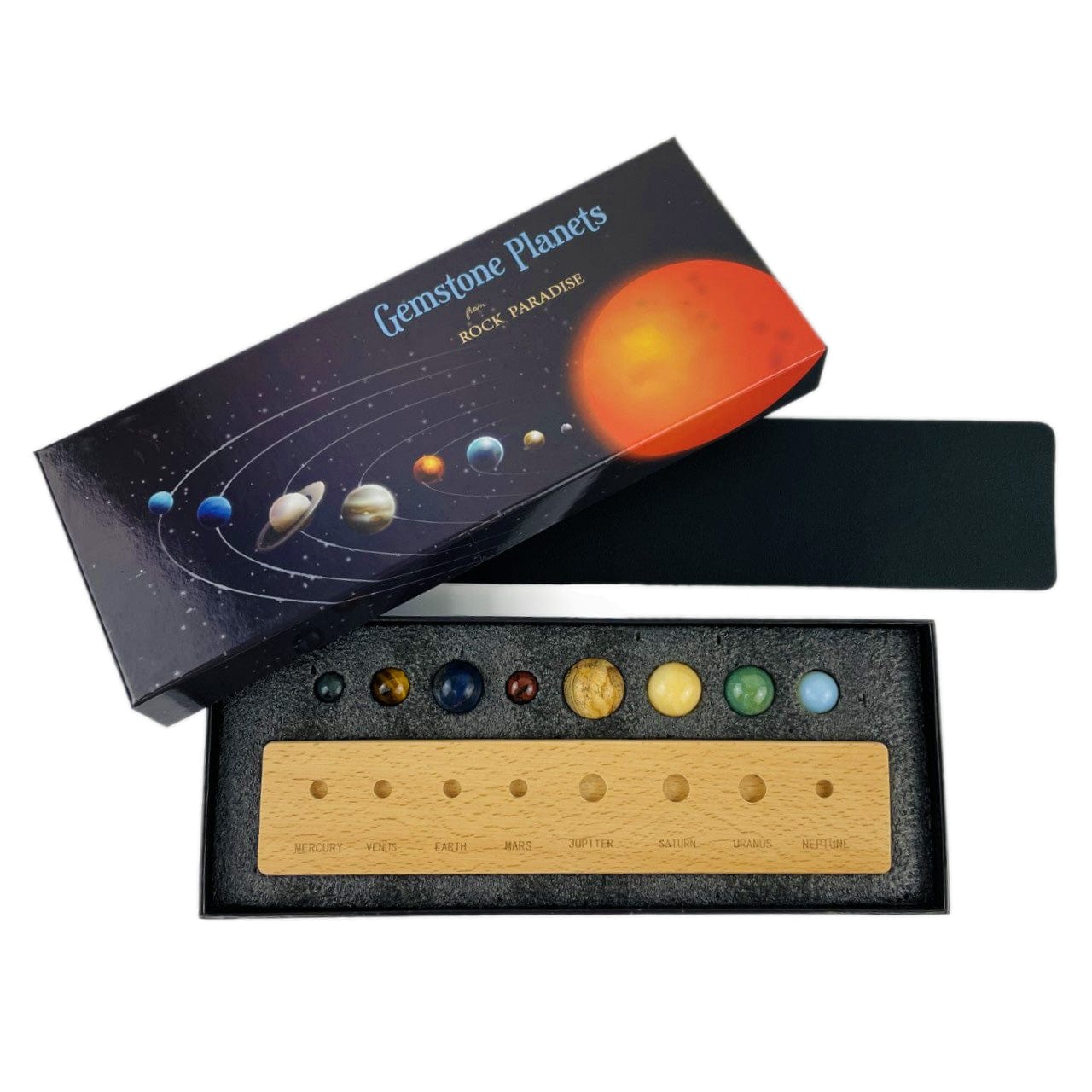 Stone Planets in a Box with a mat and a wood holder