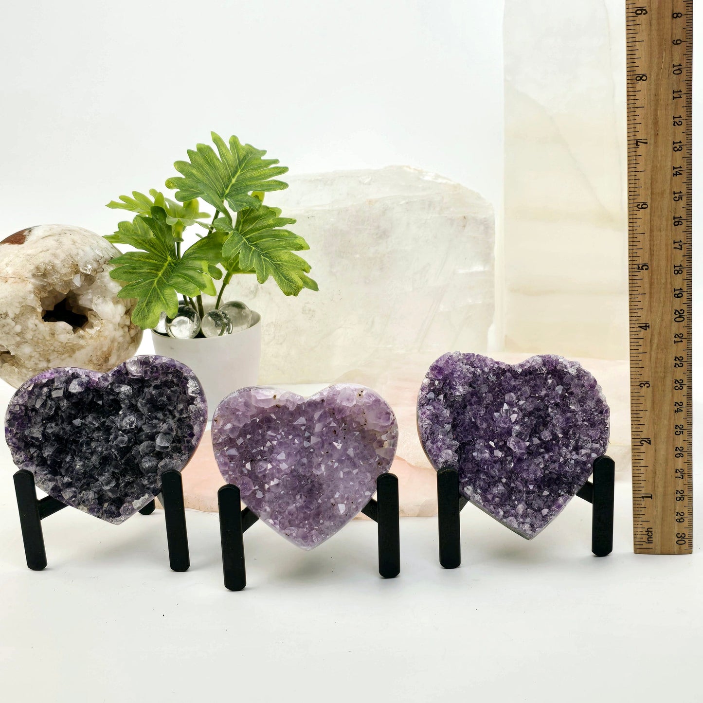 Amethyst Crystal Heart on Metal Tripod Stand with ruler for size reference