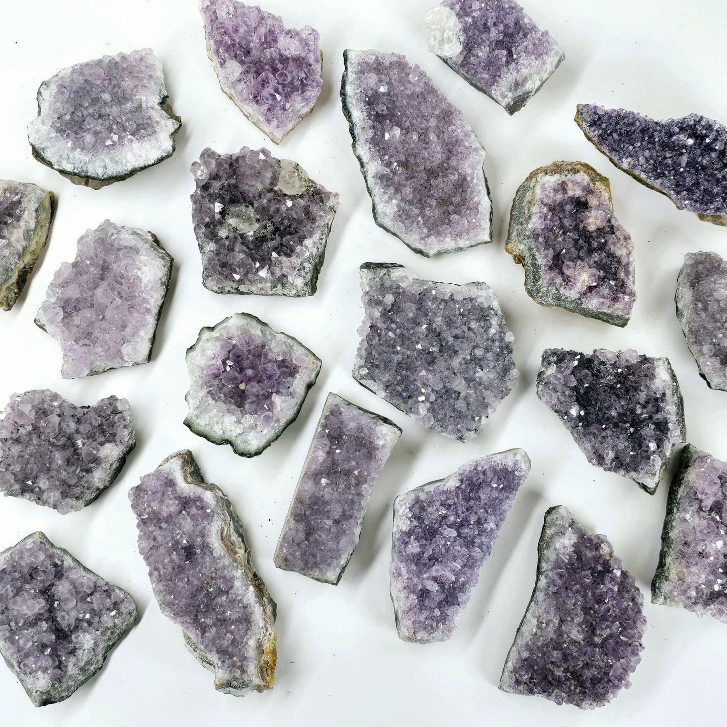 Amethyst Crystal Clusters - You Choose Quantity - 1, 5, 10 several shown on white background