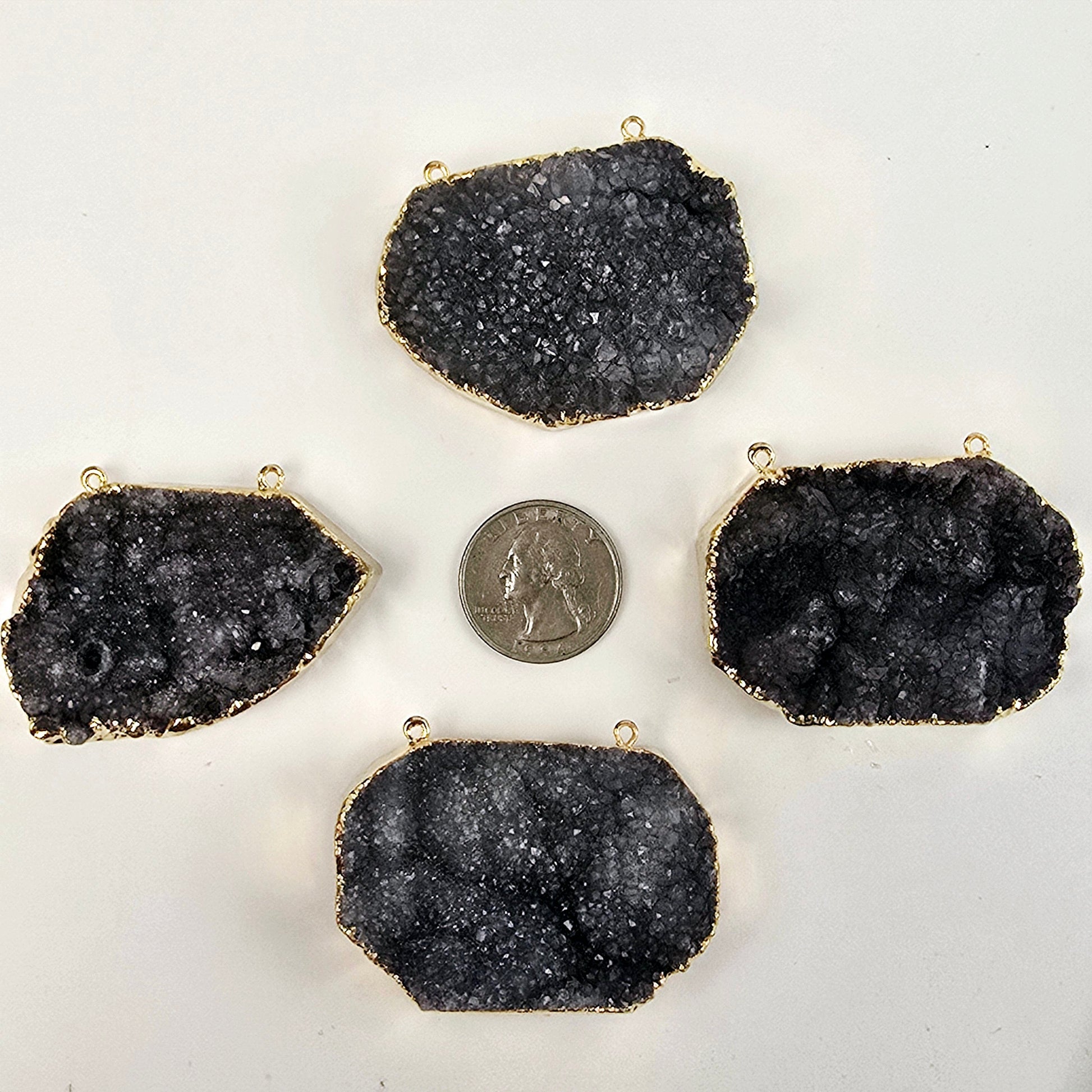 Gray Amethyst Druzy Oval Slab Pendant with 24k Gold Electroplated Edge and Double Bail four on white background with quarter for size reference