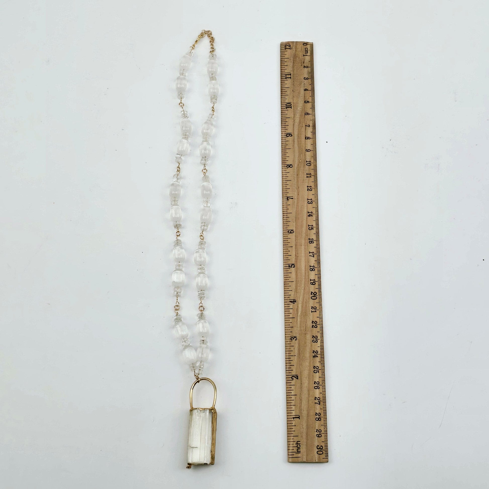 Selenite and Crystal Quartz Gold Filled Crystal Necklace - Handmade - One-of-a-Kind on white surface flat with ruler for size reference