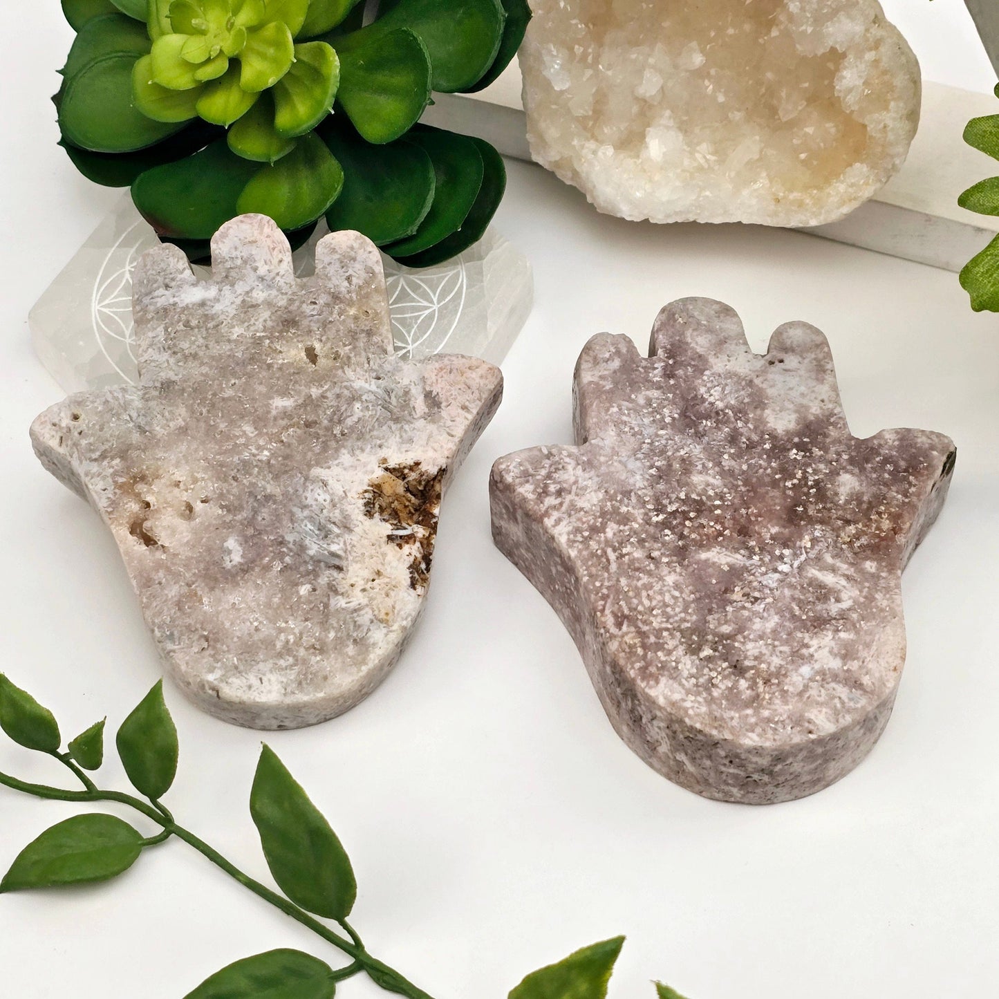 Pink Amethyst Polished Crystal Hamsa Hand - You Choose both variants with props and plants in the background