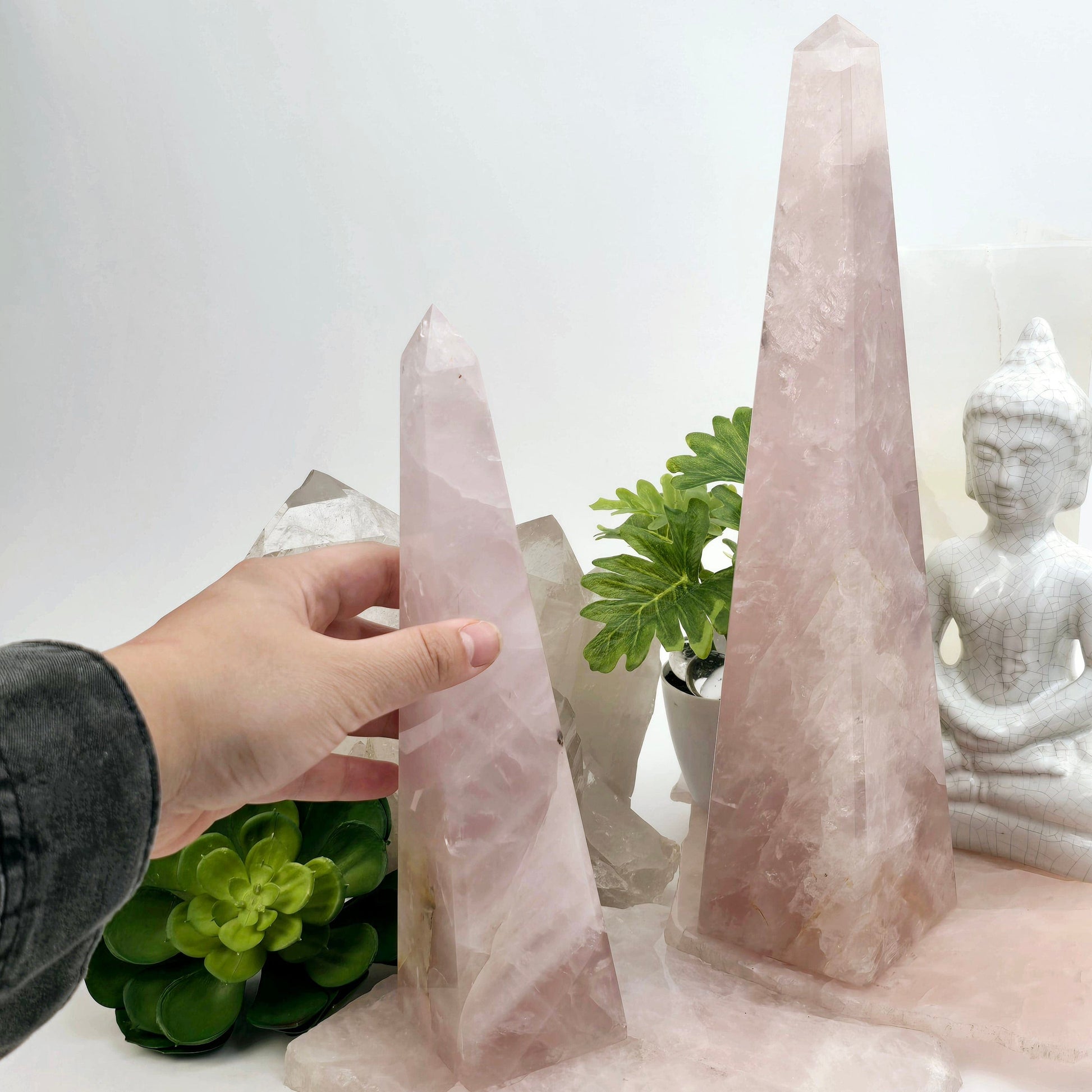 Rose Quartz Polished Crystal Obelisk - You Choose with hand for size reference