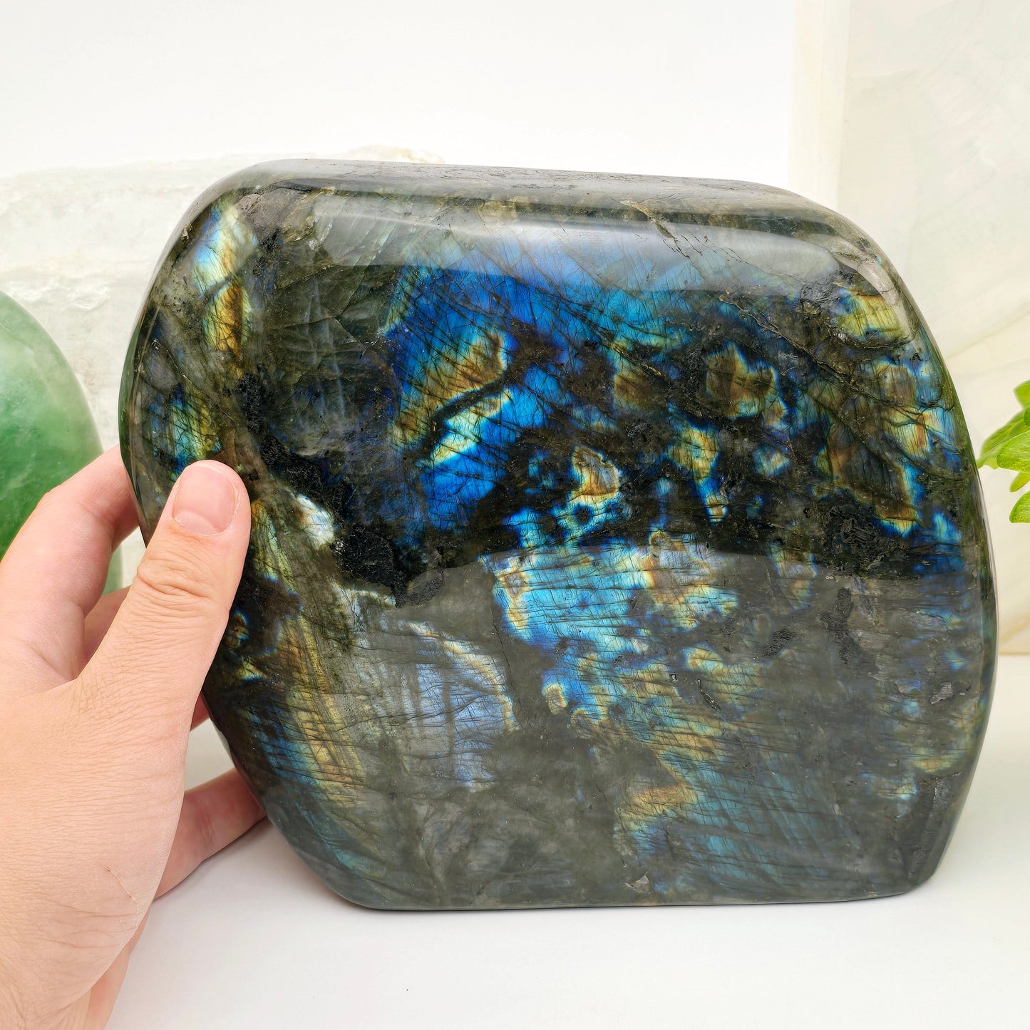Labradorite Freeform Crystal Cut Base #2 with hand for size reference