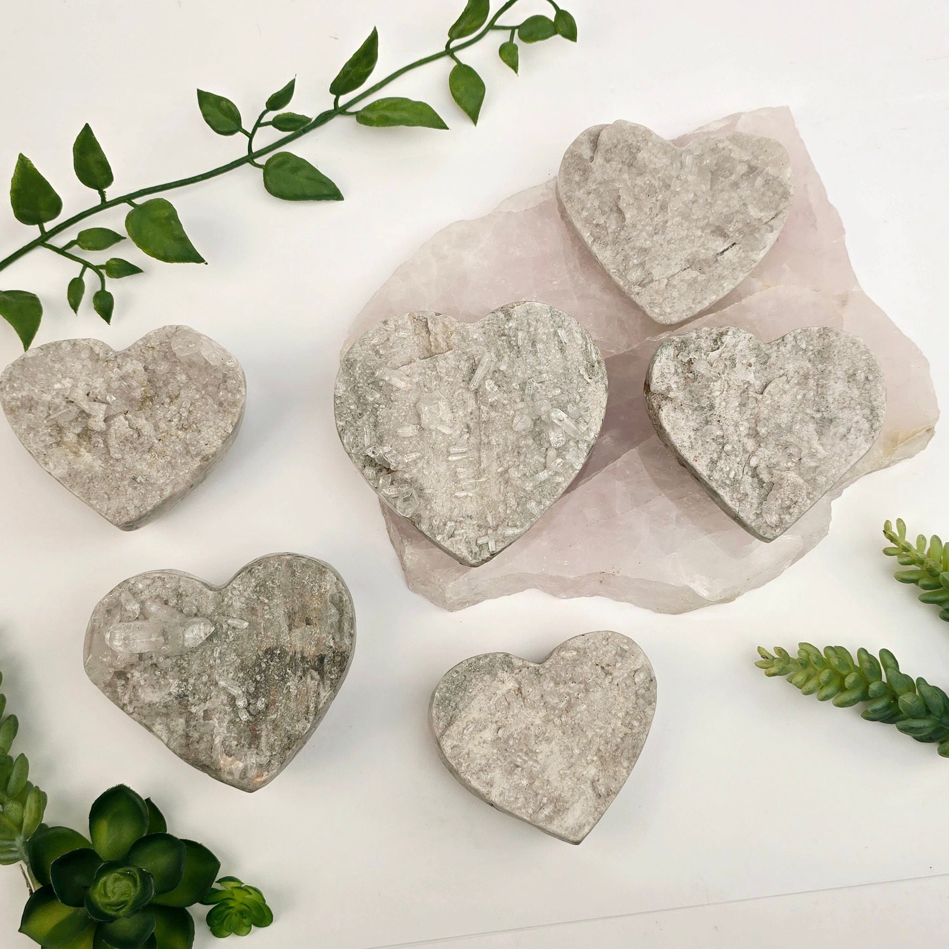 Crystal Quartz Cluster Polished Heart - You Choose #1 all variants with plants and props in the background