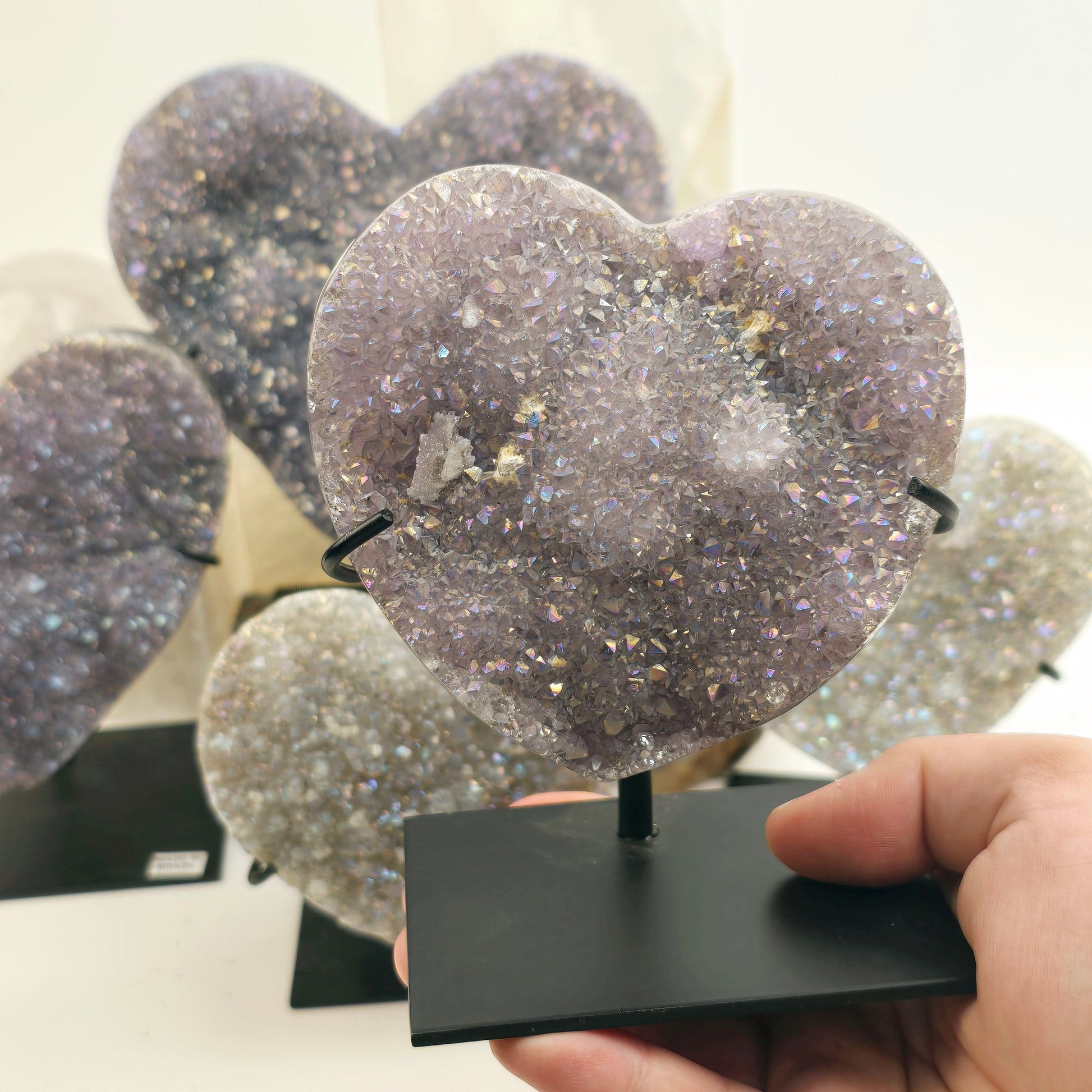 Angel Aura Amethyst Druzy Crystal Heart on Stand - You Choose - Valentine's Day Gift #1 variant 1 in hand for size reference with other variants in background with props