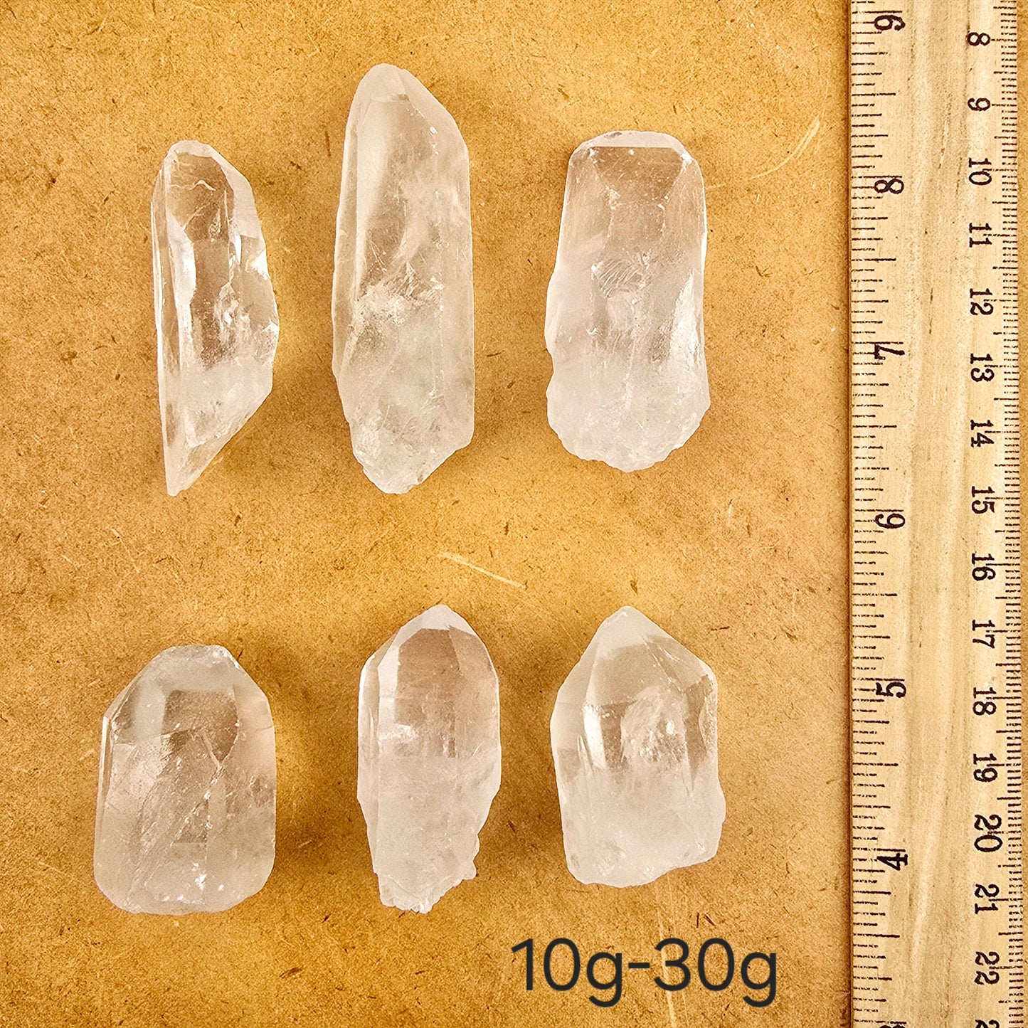 Crystal Quartz Extra Grade Points - By Weight weight 10g-30g variant labeled with ruler for size reference