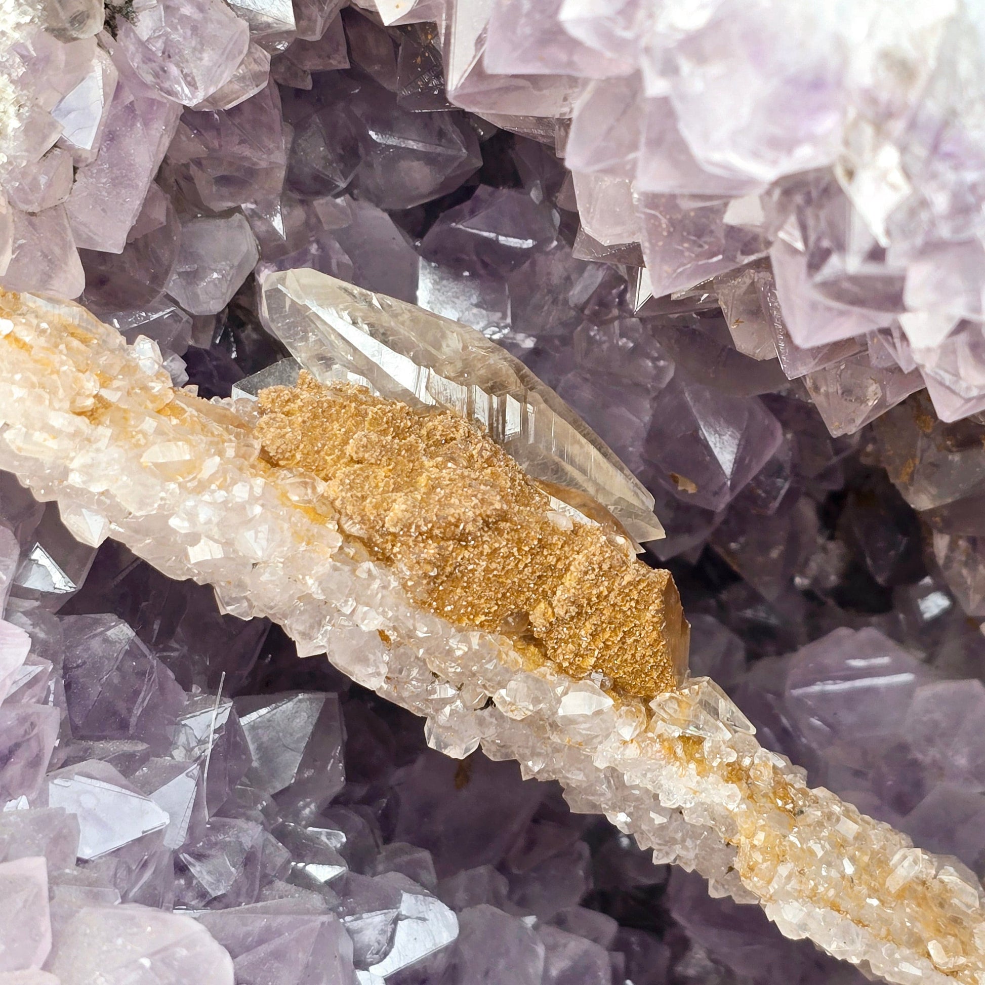 Amethyst Large Crystal Cluster with Druzy Stalactite and Double Terminated Calcite on Metal Stand closeup for detail