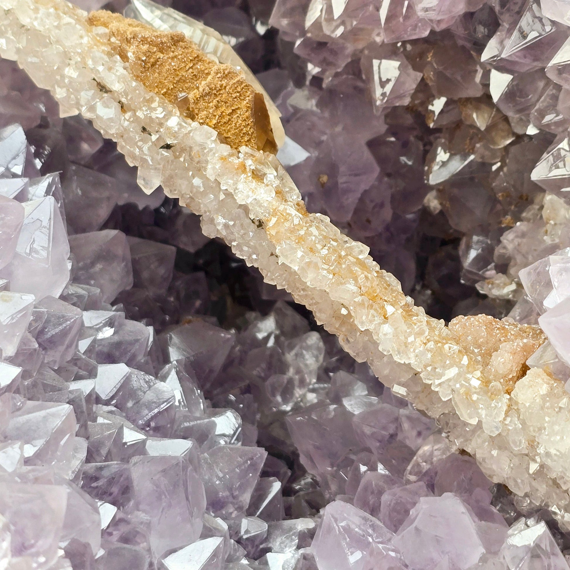 Amethyst Large Crystal Cluster with Druzy Stalactite and Double Terminated Calcite on Metal Stand closeup for detail