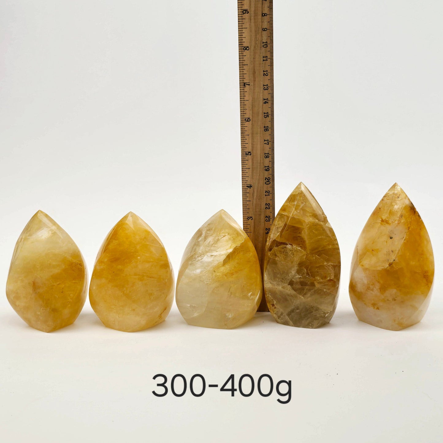 Golden Healer Crystal Flame Point Cut Base - By Weight 300-400g variant labeled with ruler for size reference