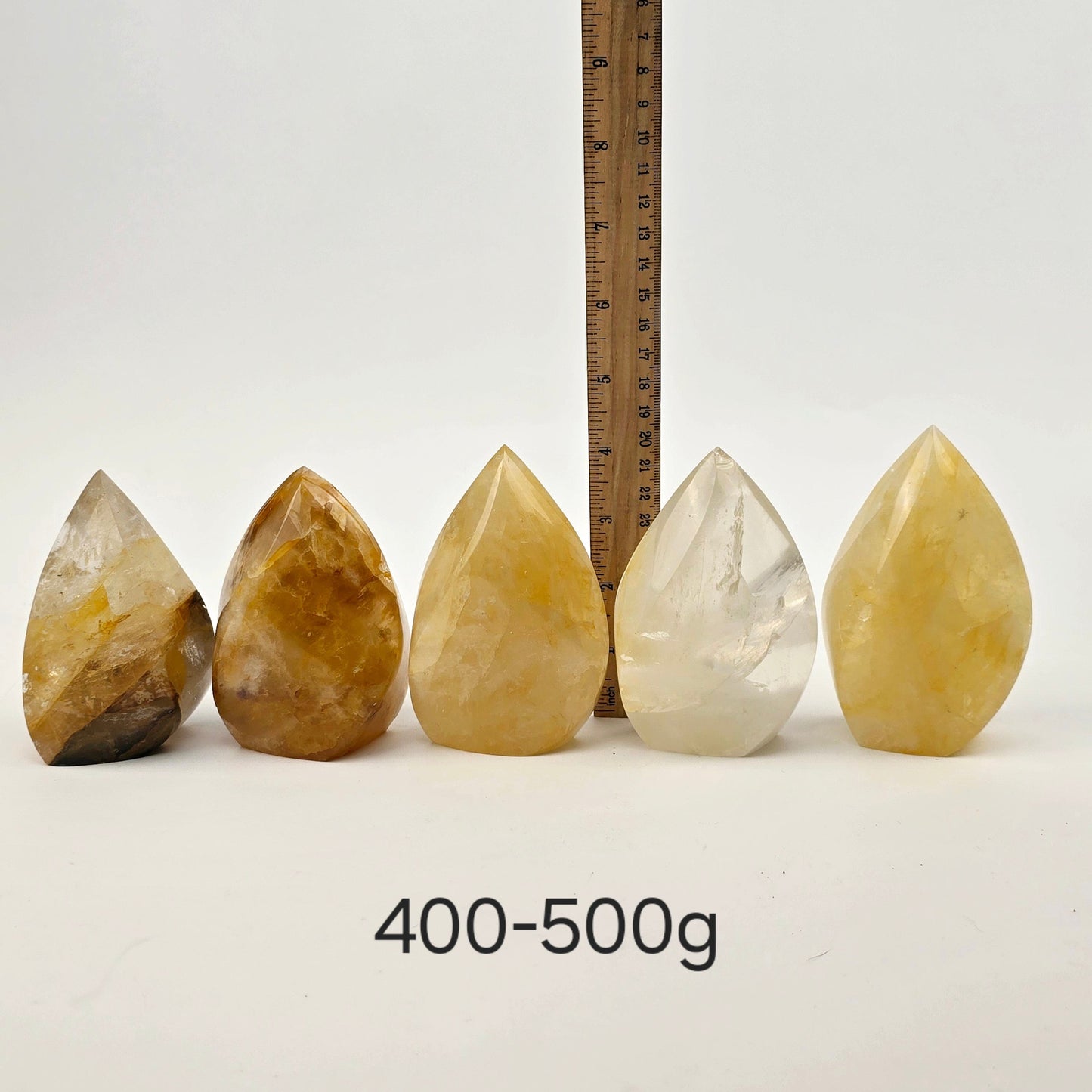 Golden Healer Crystal Flame Point Cut Base - By Weight 400-500g variant labeled with ruler for size reference