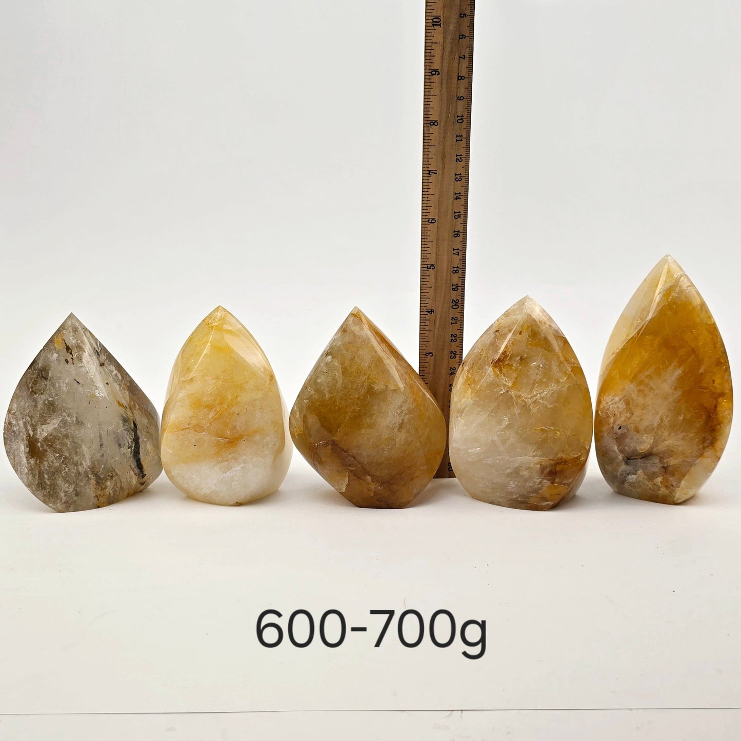 Golden Healer Crystal Flame Point Cut Base - By Weight 600-700g variant labeled with ruler for size reference