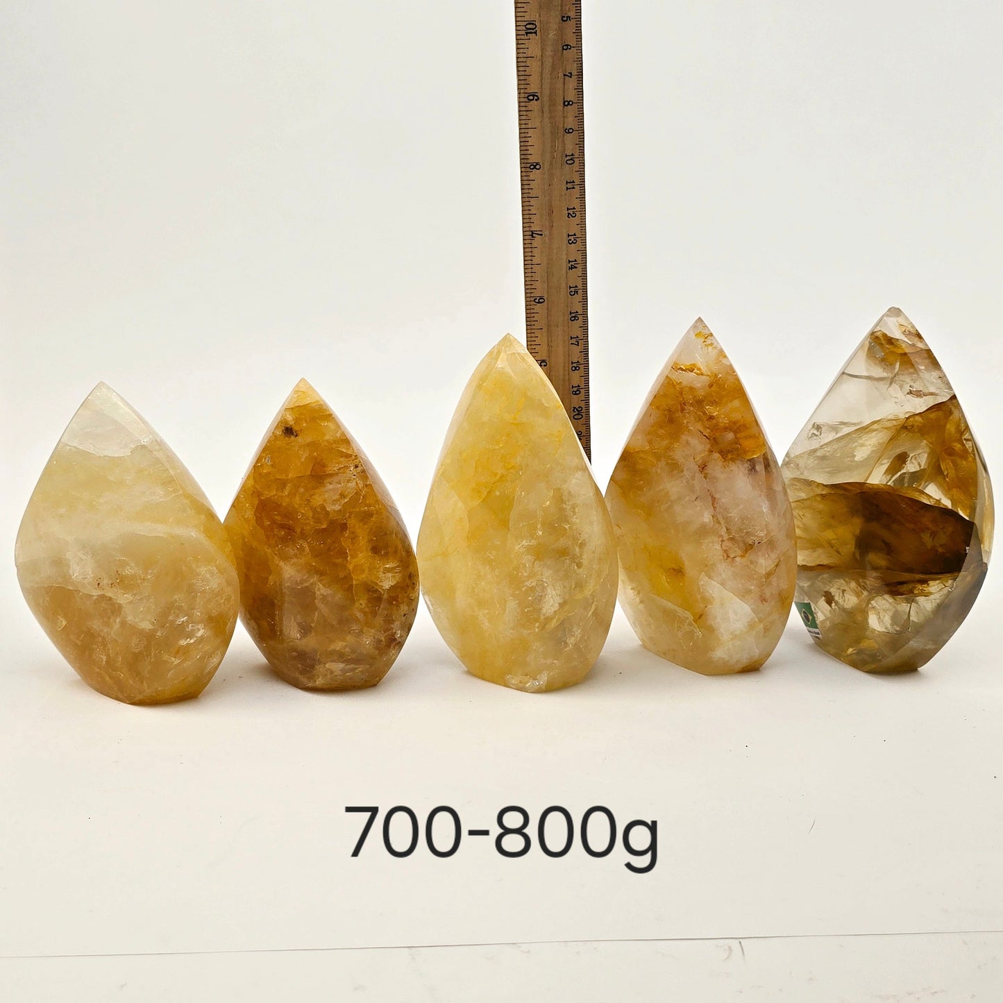 Golden Healer Crystal Flame Point Cut Base - By Weight 700-800g variant labeled with ruler for size reference
