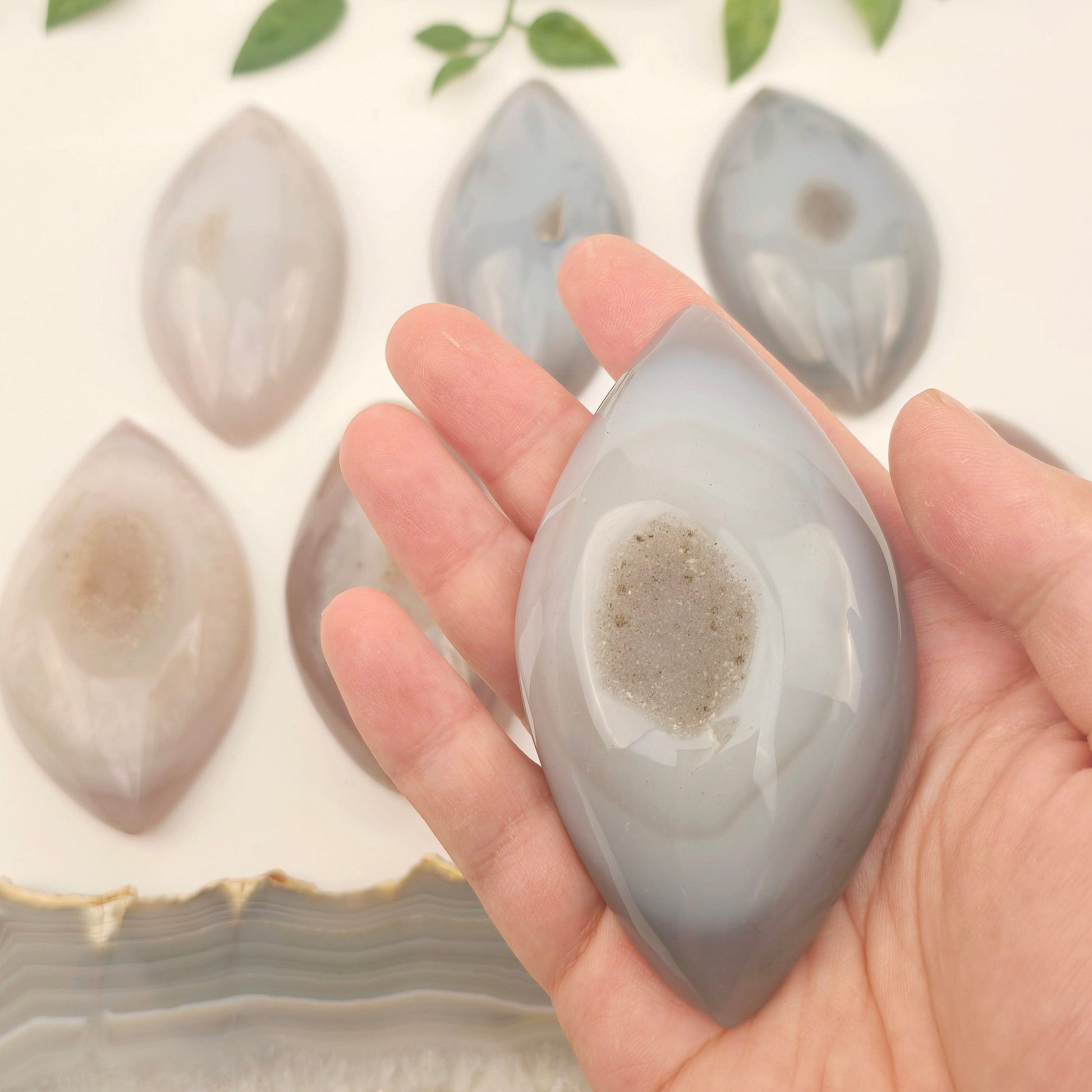 Agate - Large Natural Agate Druzy Polished Marquise Crystal Cabochon - You Choose - variant 6 in hand for size reference with other variants in the background
