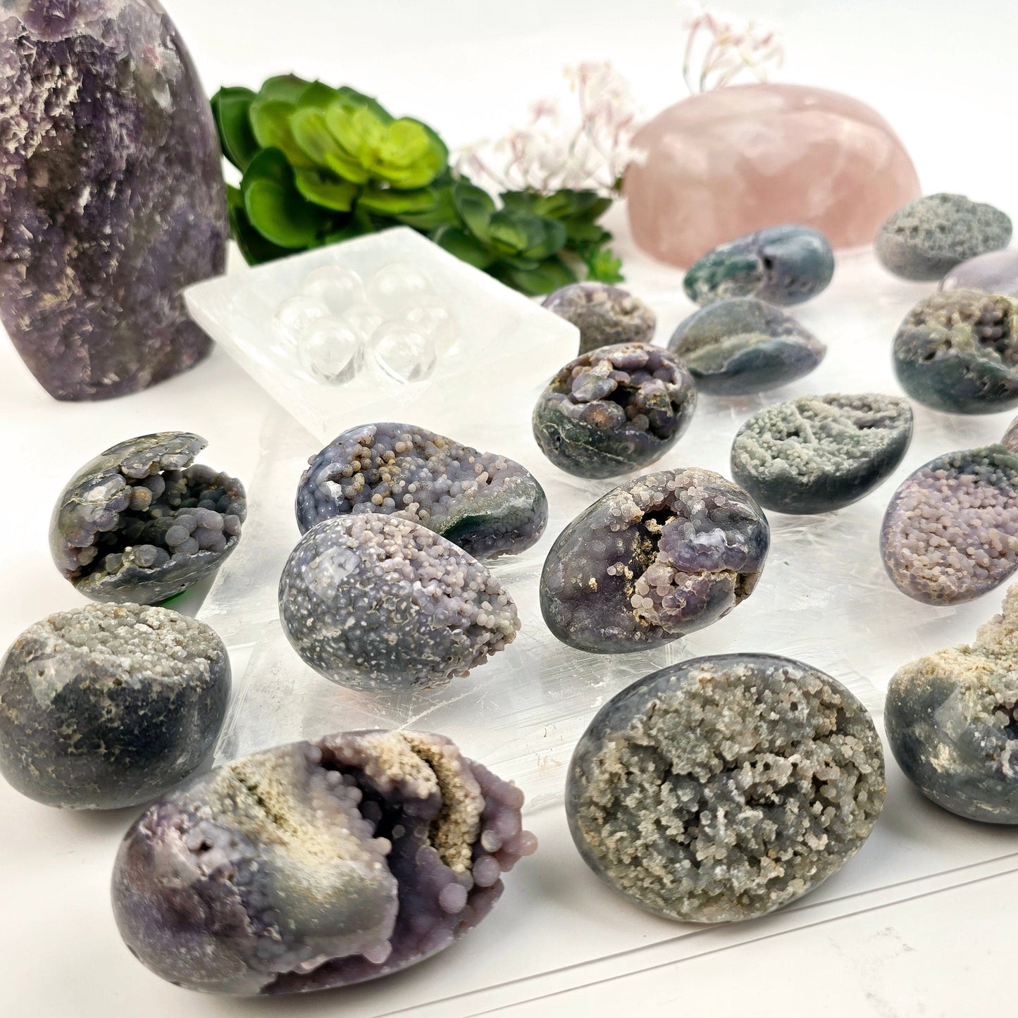 Grape Agate Polished Crystal Egg from Indonesia - You Choose #1 closeup for detail of multiple variants side view