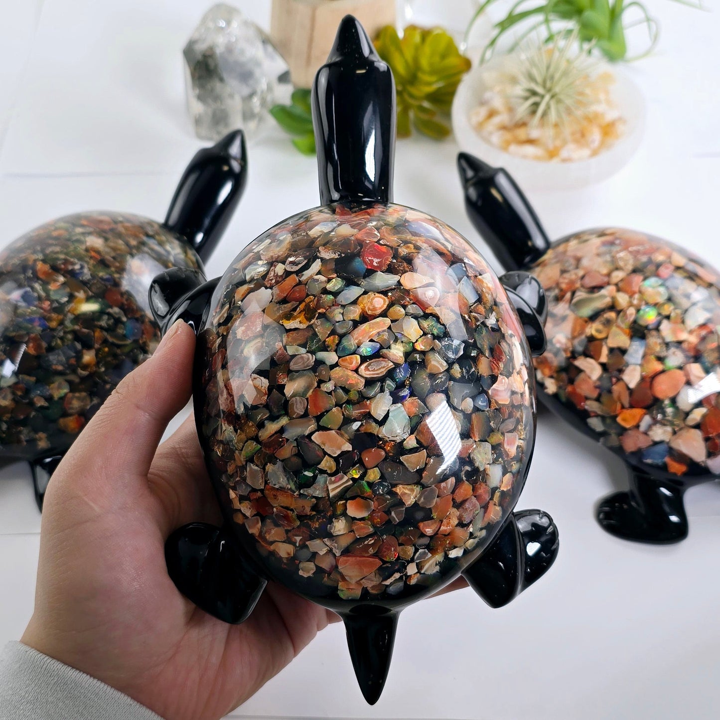 Opal Crystal and Resin Turtle - Large - You Choose variant 1 in hand for size reference with other variants in the background