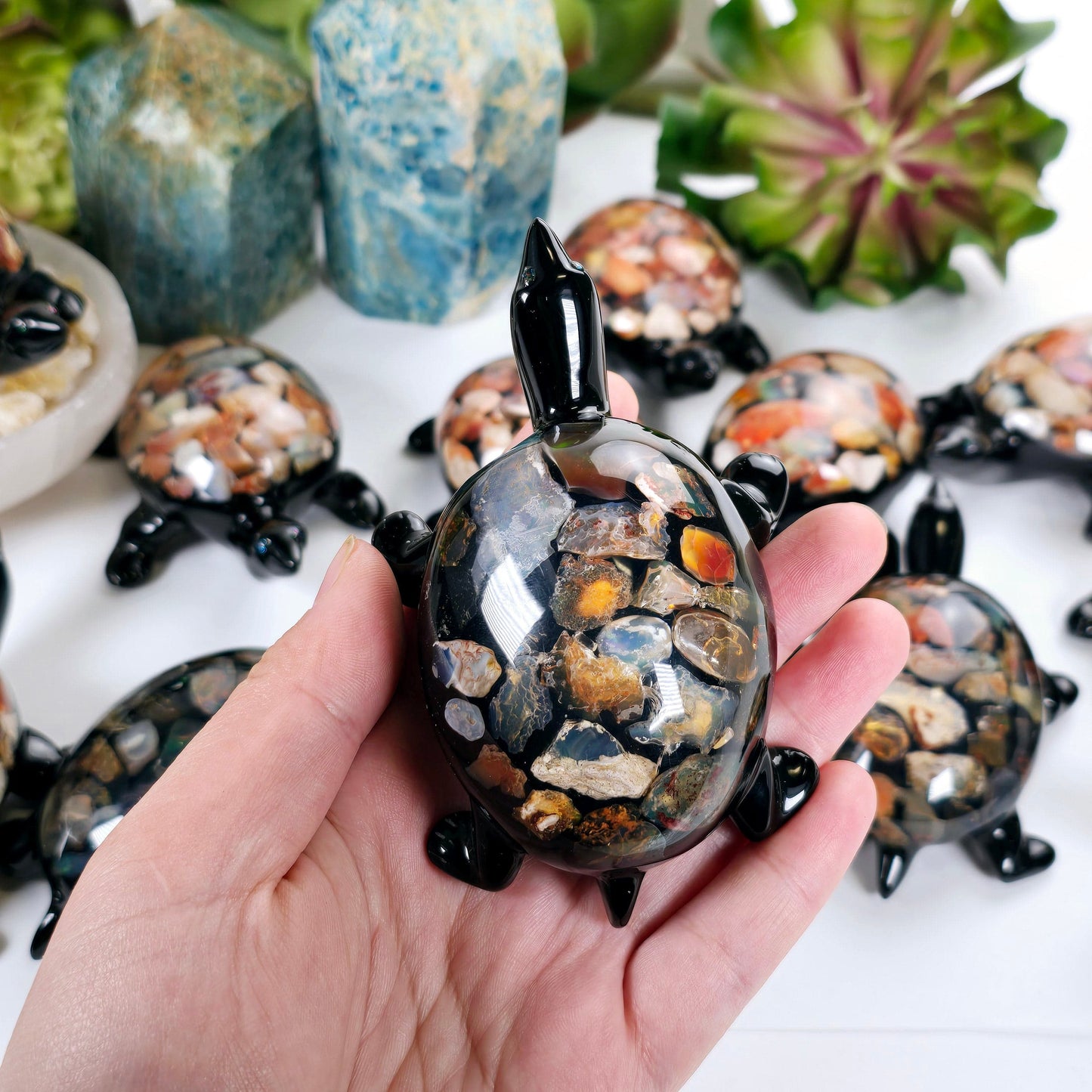 Opal Crystal and Resin Turtle - Small - You Choose one variant in hand for size reference with other variants in the background with props and plants