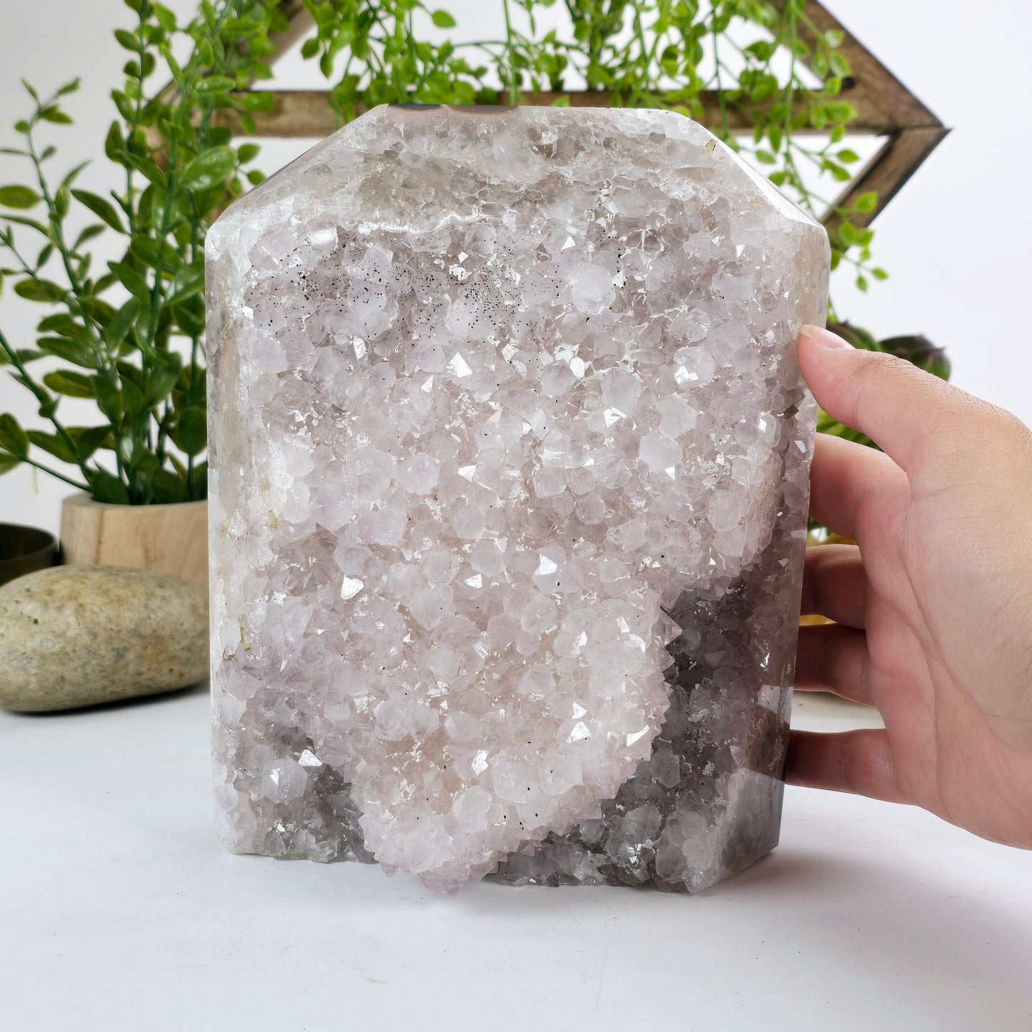 Amethyst - Light Amethyst Crystal Cut Base - One-of-a-Kind with hand for size reference