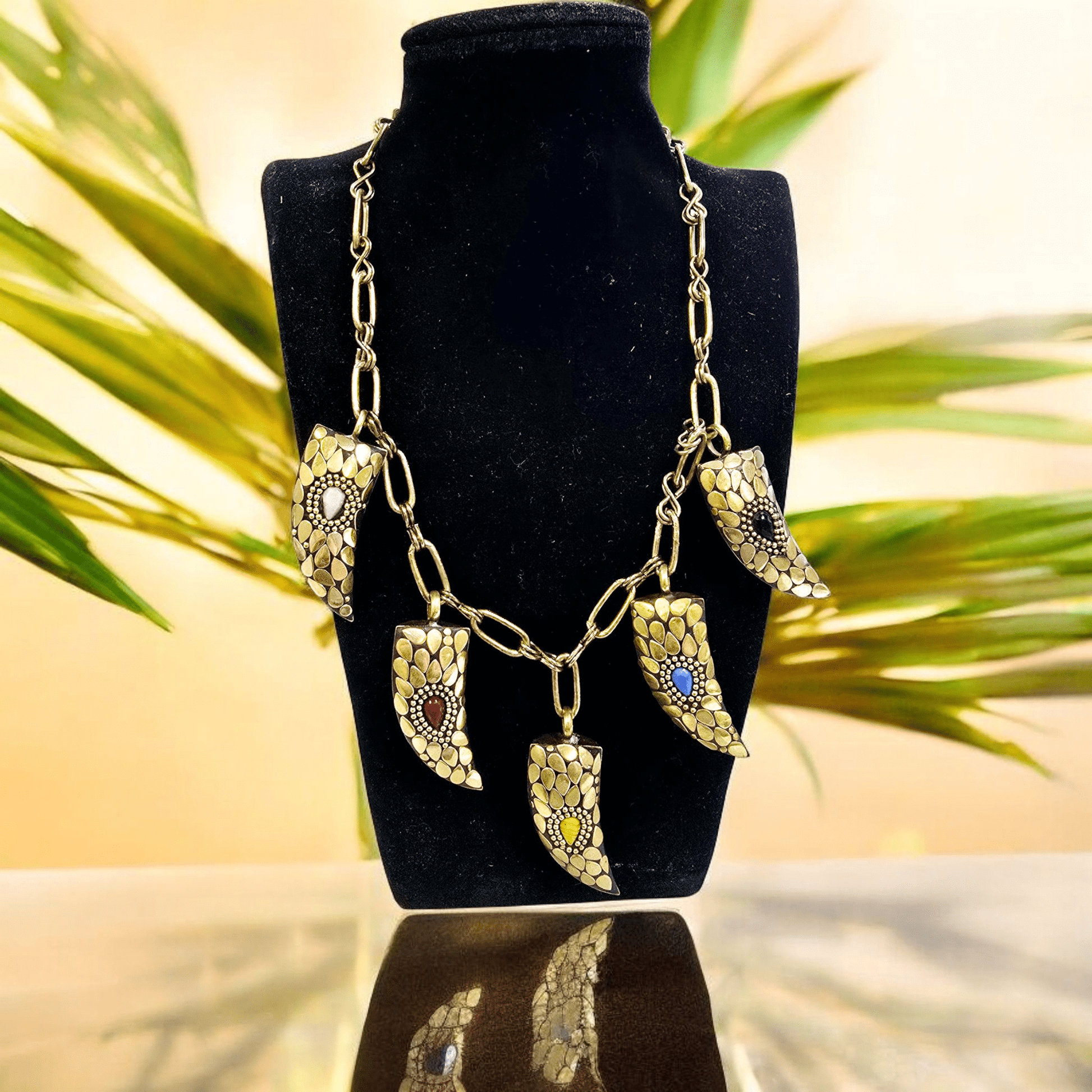 Brass Tibetan Horn with Crystal Teardrop Accent Necklace - One-of-a-Kind - Handmade on necklace stand