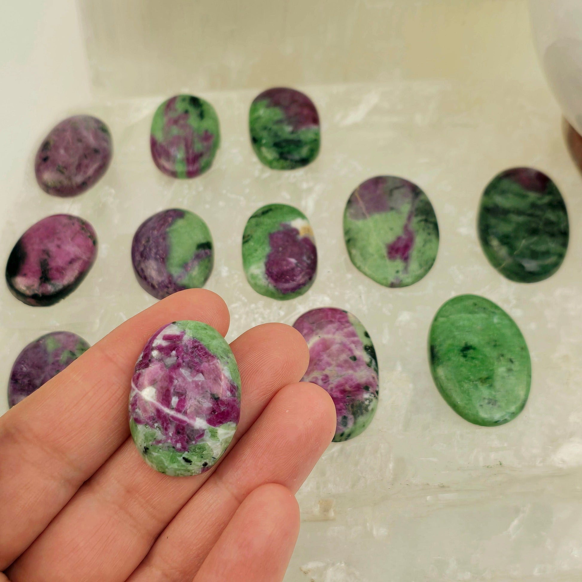 Ruby Zoisite - Anyolite - Crystal Oval Cabochon - You Choose one variant in hand for size reference with other variants in the background