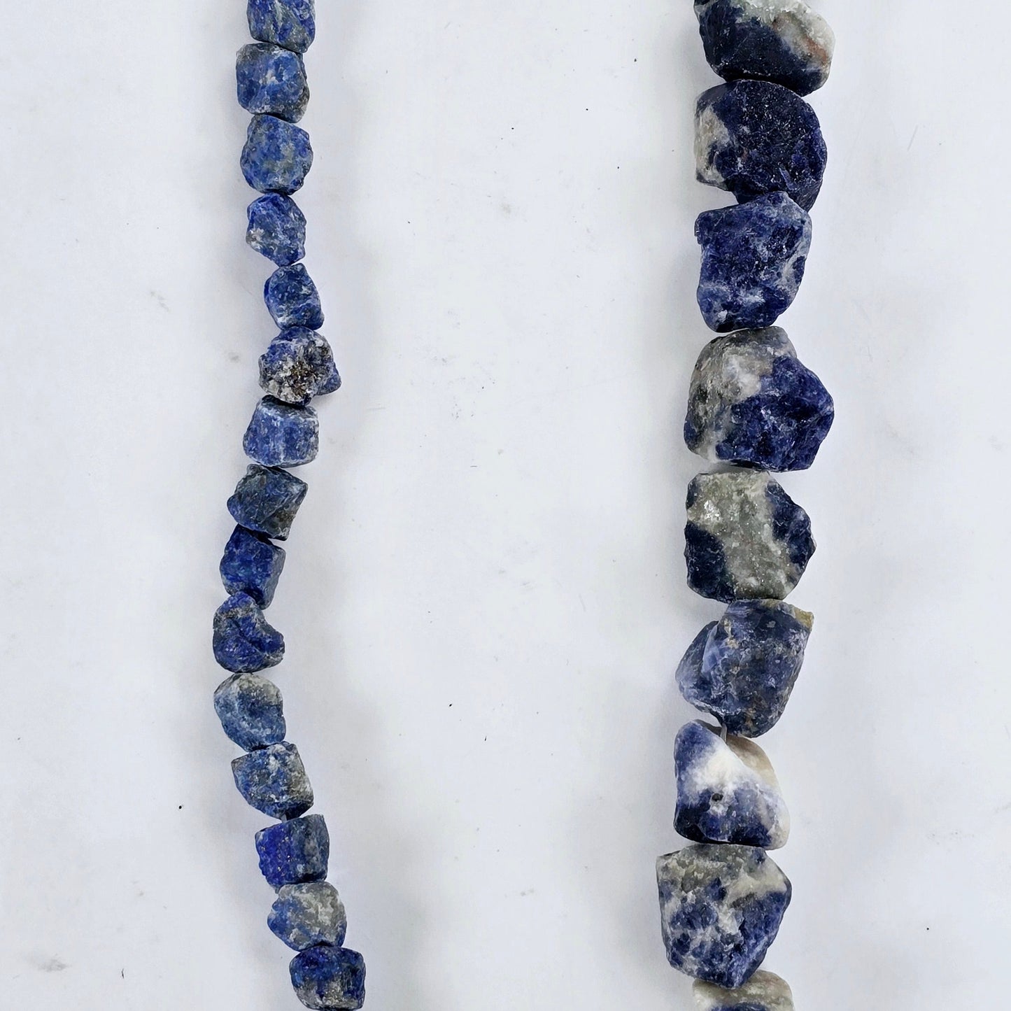 Rough Sodalite Crystal Beads - Full Strand - You Choose Size a single strand of each size on white background