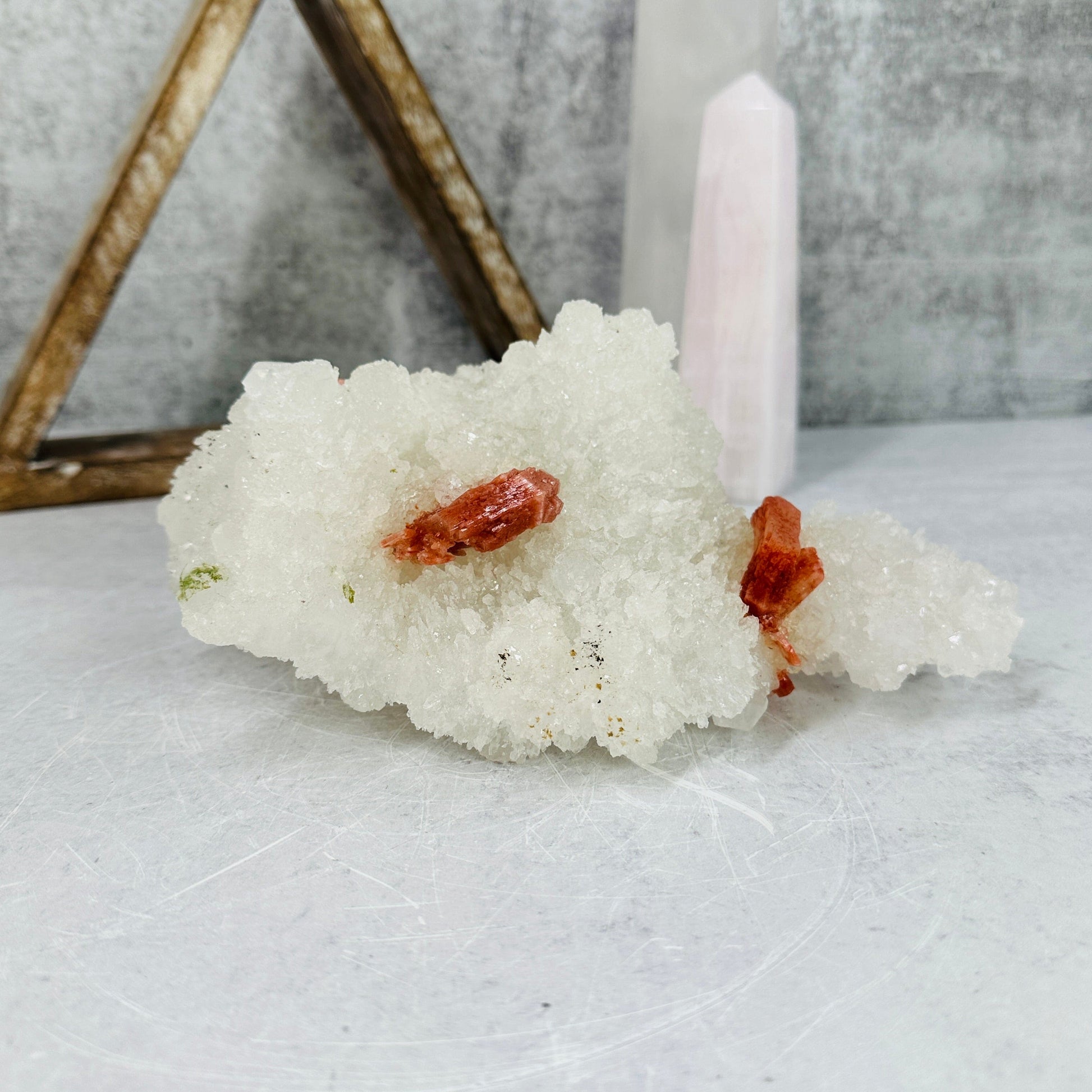 apophyllite with stilbite cluster with decorations in the background