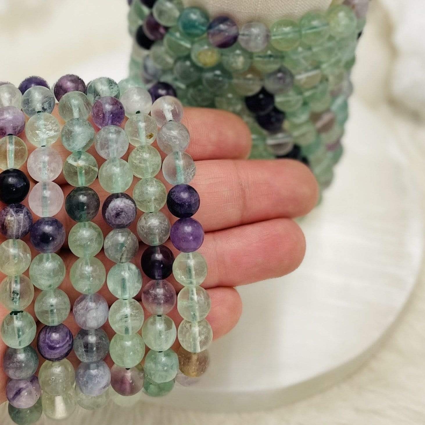 bracelets in hand for size reference 
