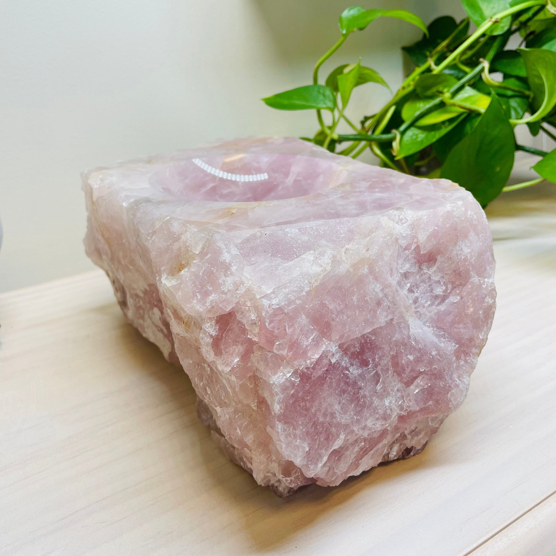 close up of the rough stone on the rose quartz bowl 