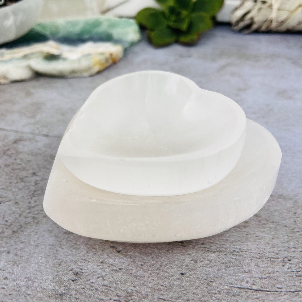 2 sizes Selenite Heart Bowls  stacked from side view